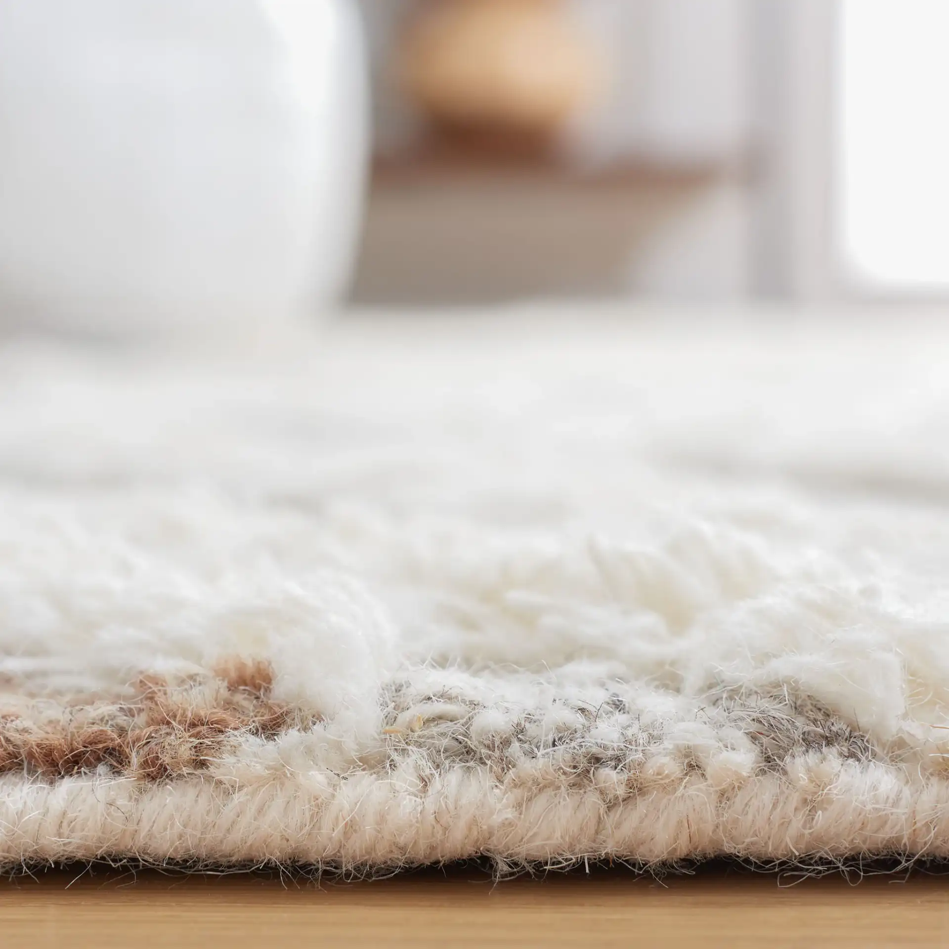 Casablanca Tribal Diamond Hand-Tufted Shag Wool Rug in Gray / Ivory in a styled room