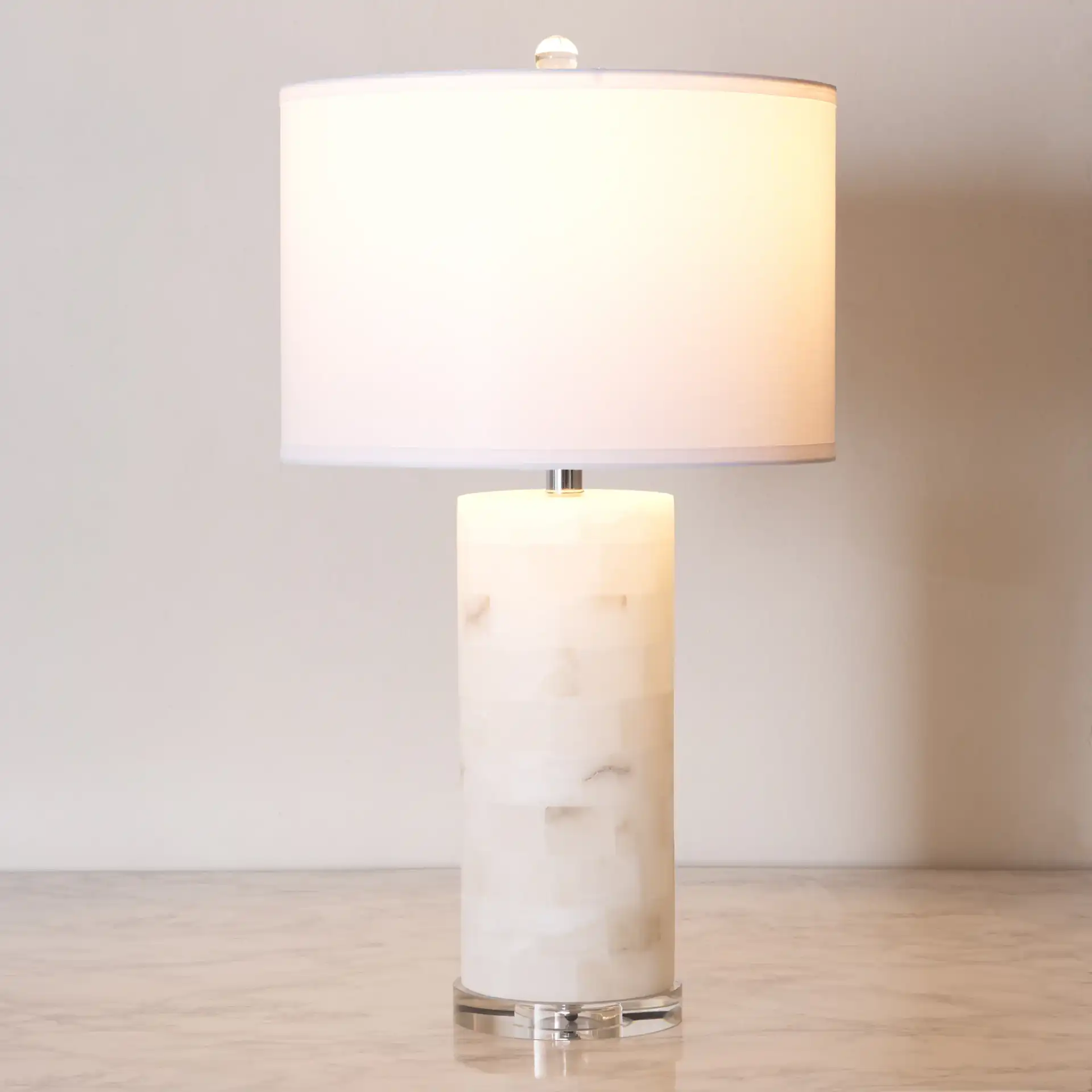 Massey Round Alabaster Table Lamp in White / Chrome in a styled room