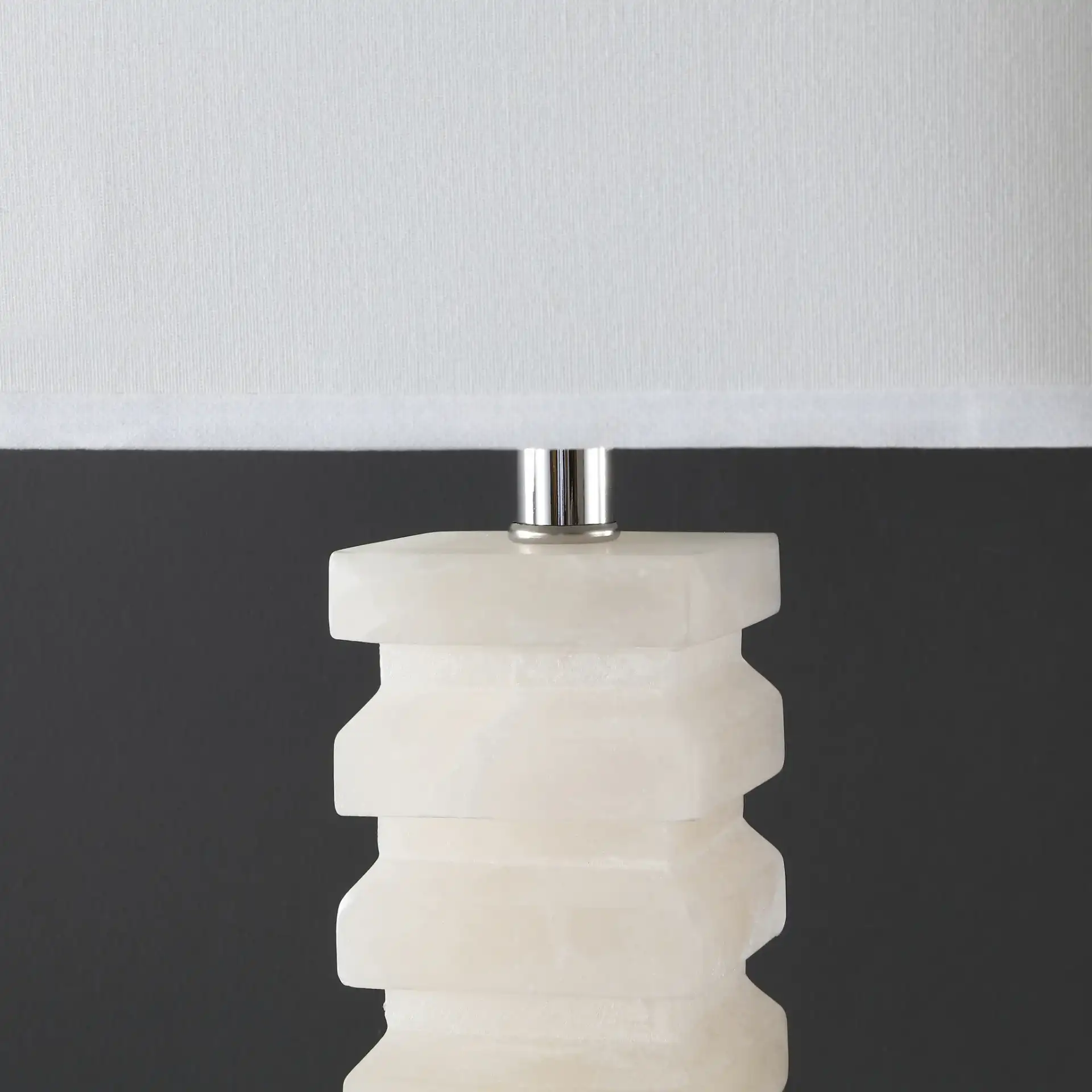 Anita Alabaster Table Lamp in White in a styled room