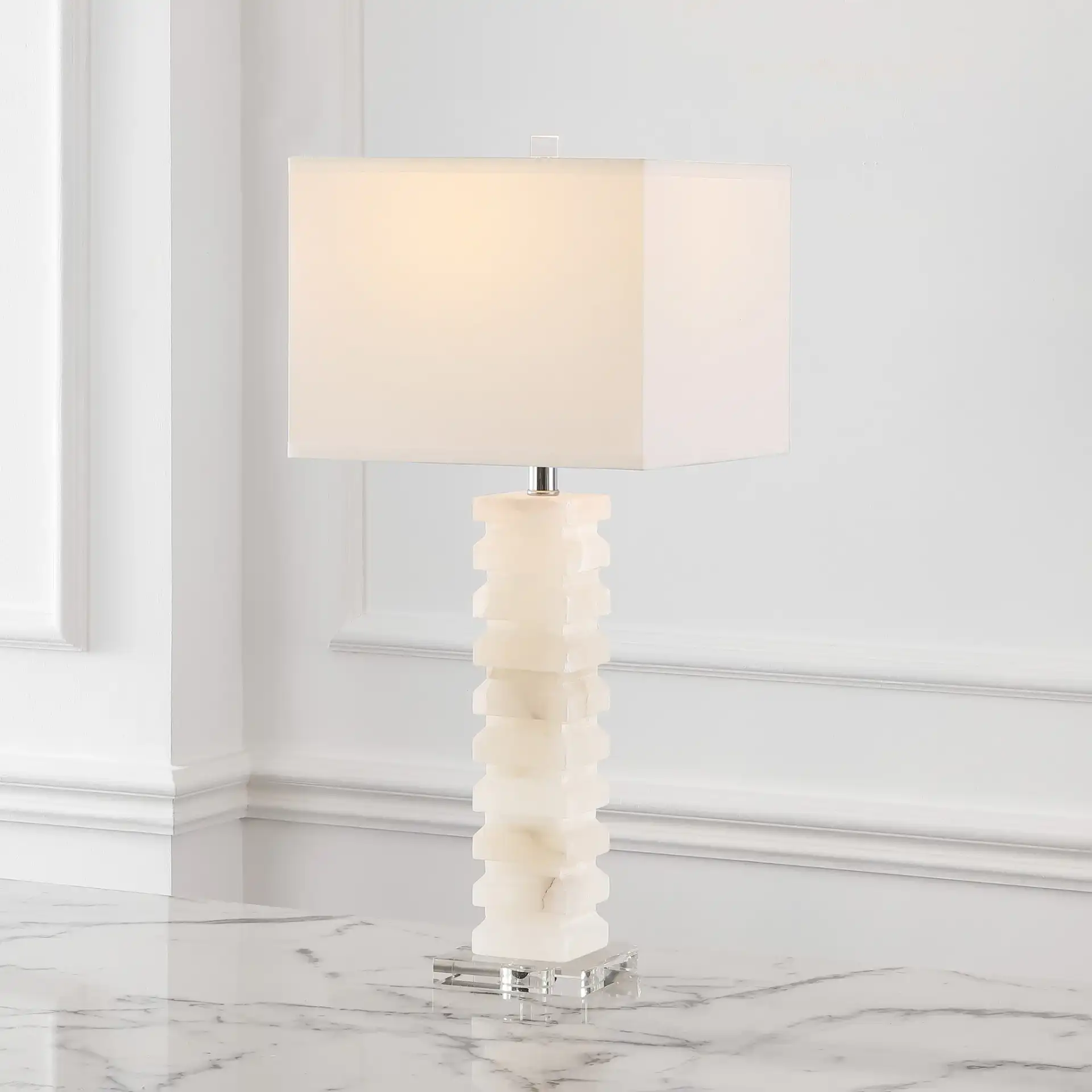 Anita Alabaster Table Lamp in White in a styled room