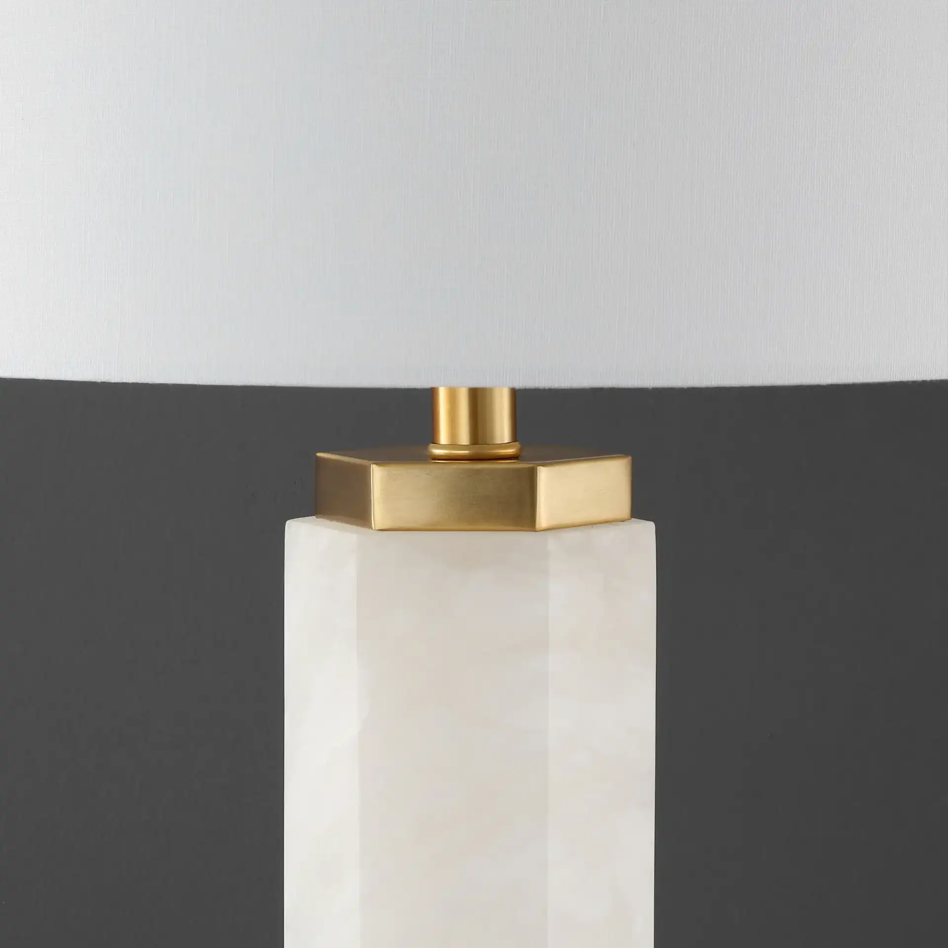 Lynsey Alabaster Table Lamp in Gold / White in a styled room