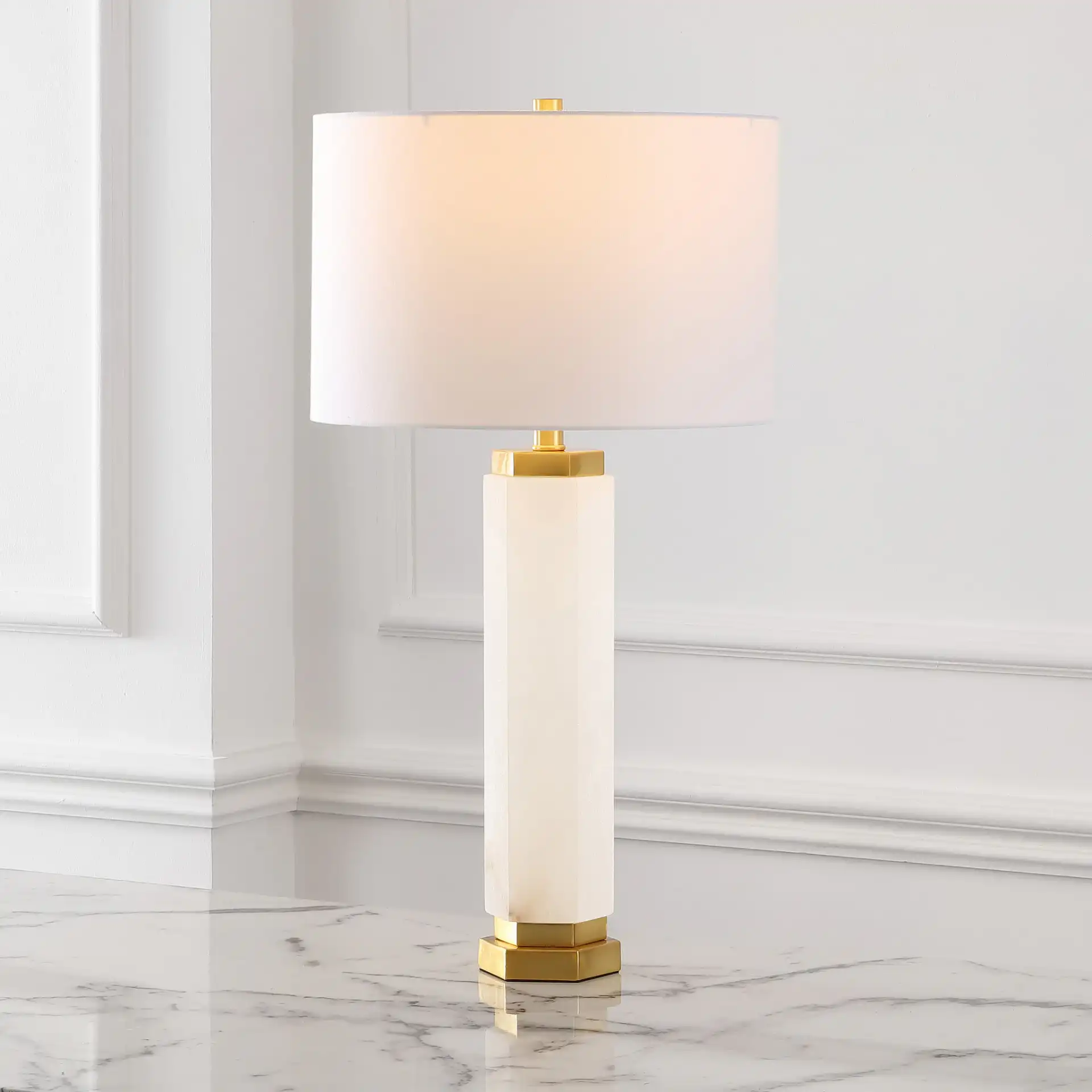 Lynsey Alabaster Table Lamp in Gold / White in a styled room