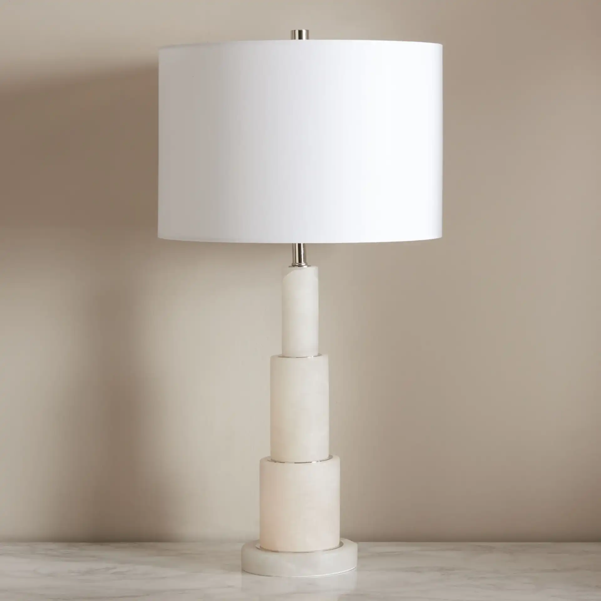 Gardiner Alabaster Table Lamp in White / Gold in a styled room