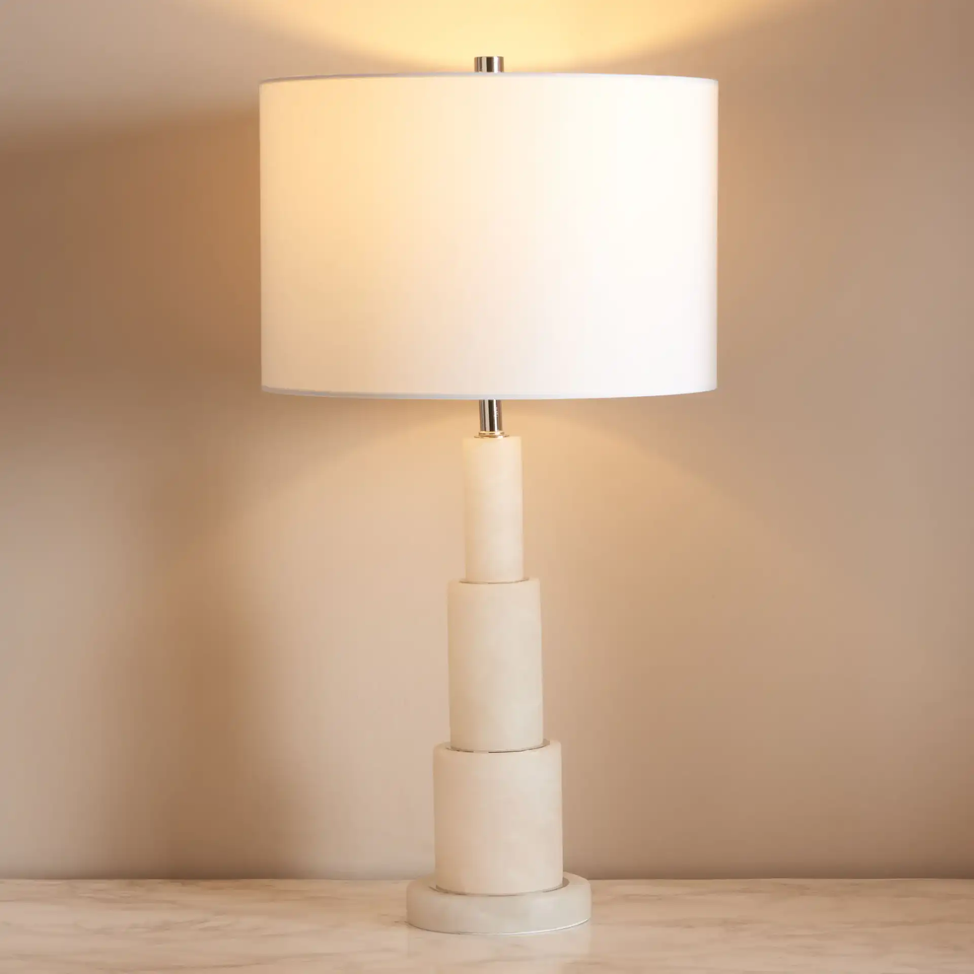 Gardiner Alabaster Table Lamp in White / Gold in a styled room