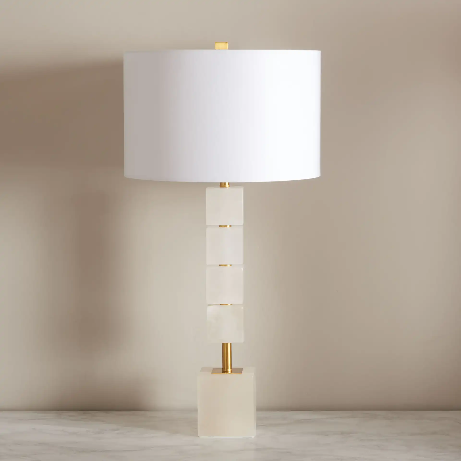 Johnny Alabaster Table Lamp in White / Gold in a styled room