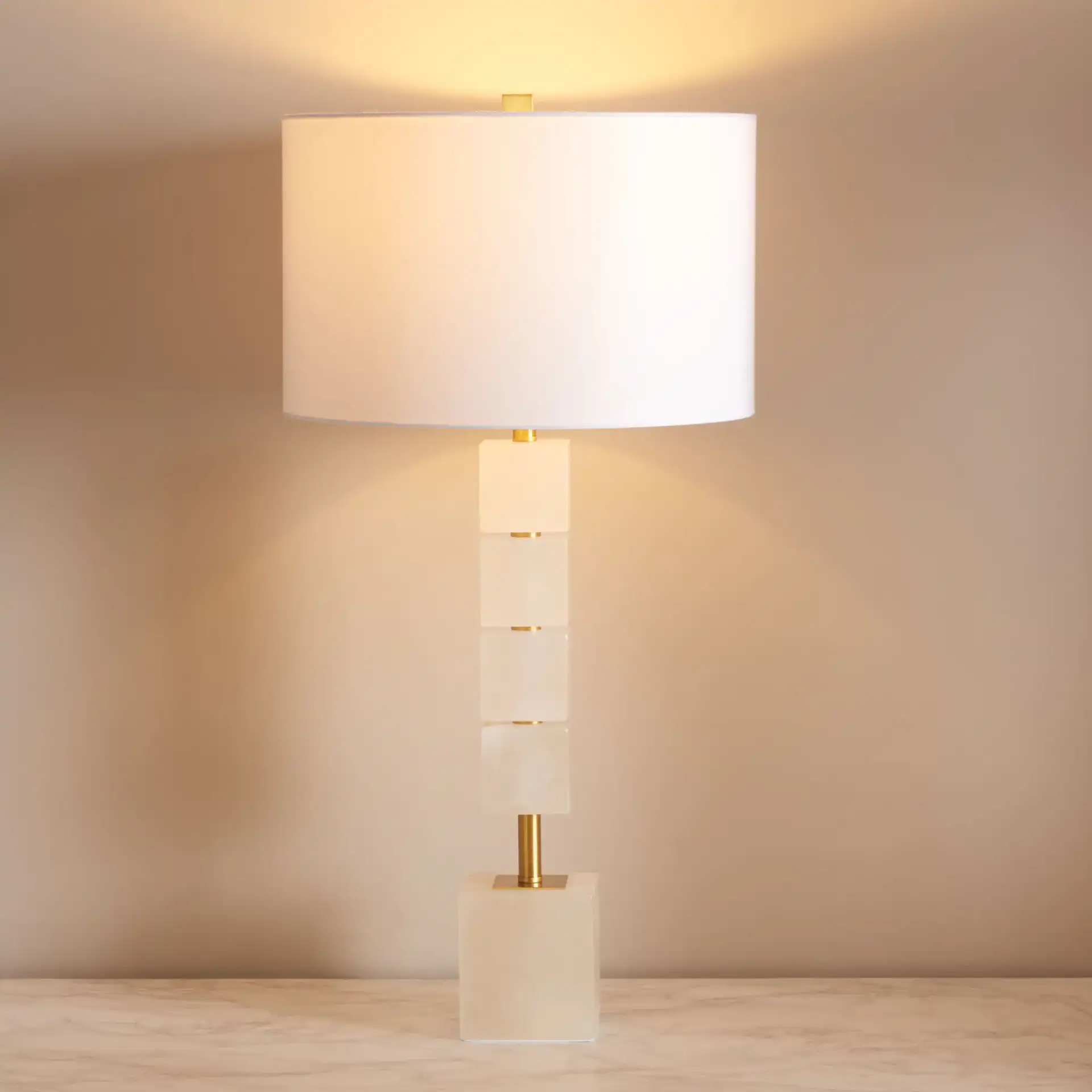 Johnny Alabaster Table Lamp in White / Gold in a styled room