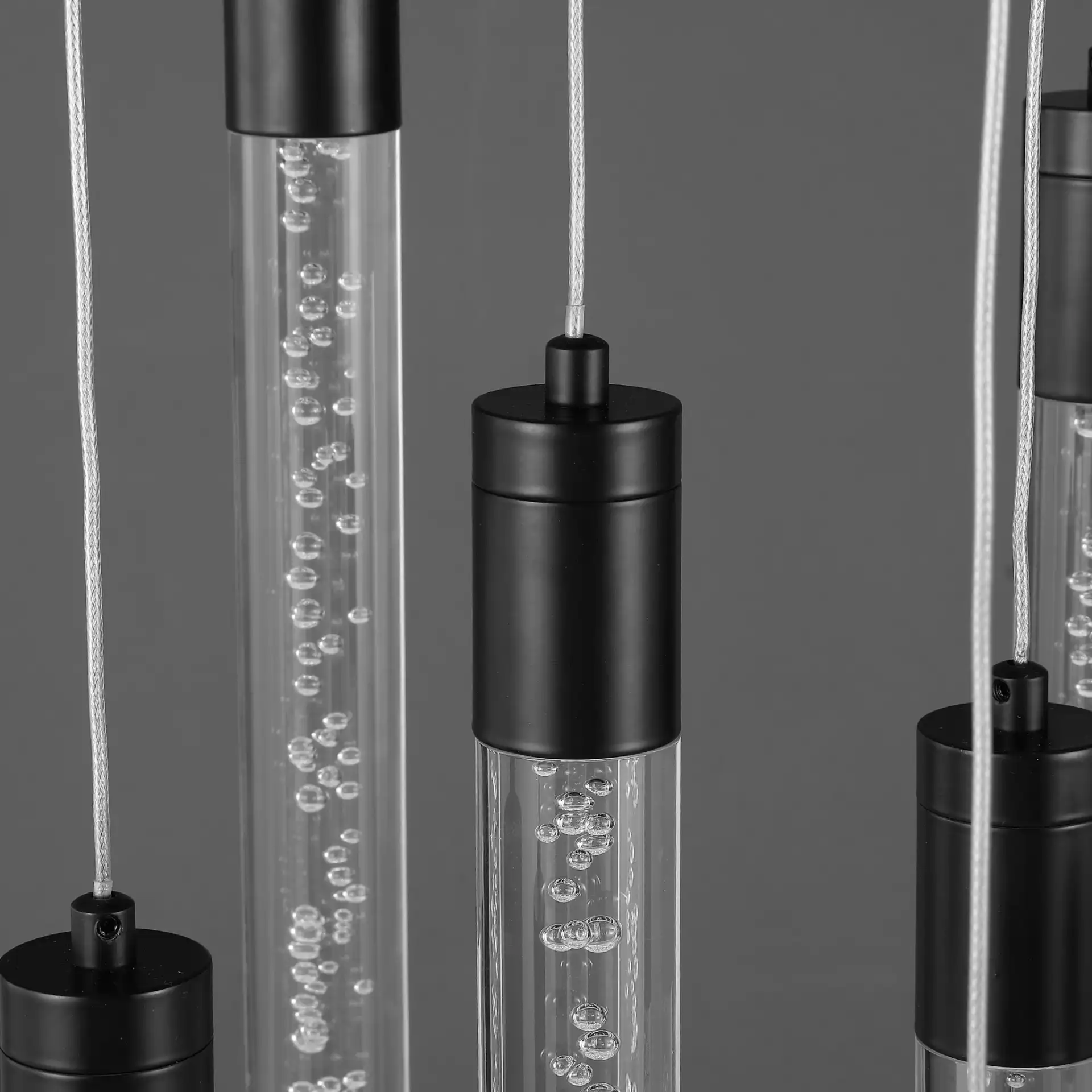Nicolle Acrylic Nine-Light Chandelier in Black in a styled room