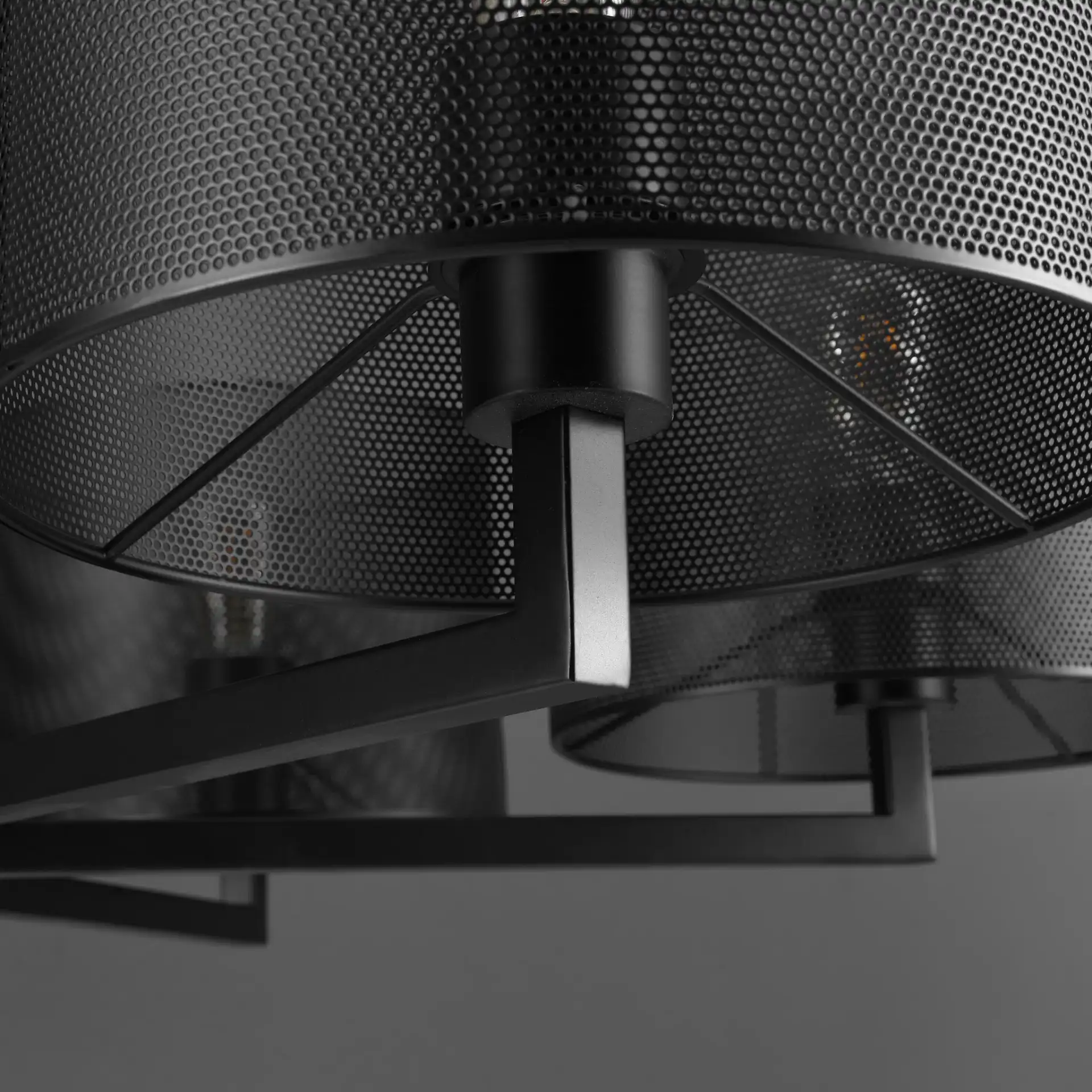 Zachaeus Six-Light Metal Chandelier in Black in a styled room