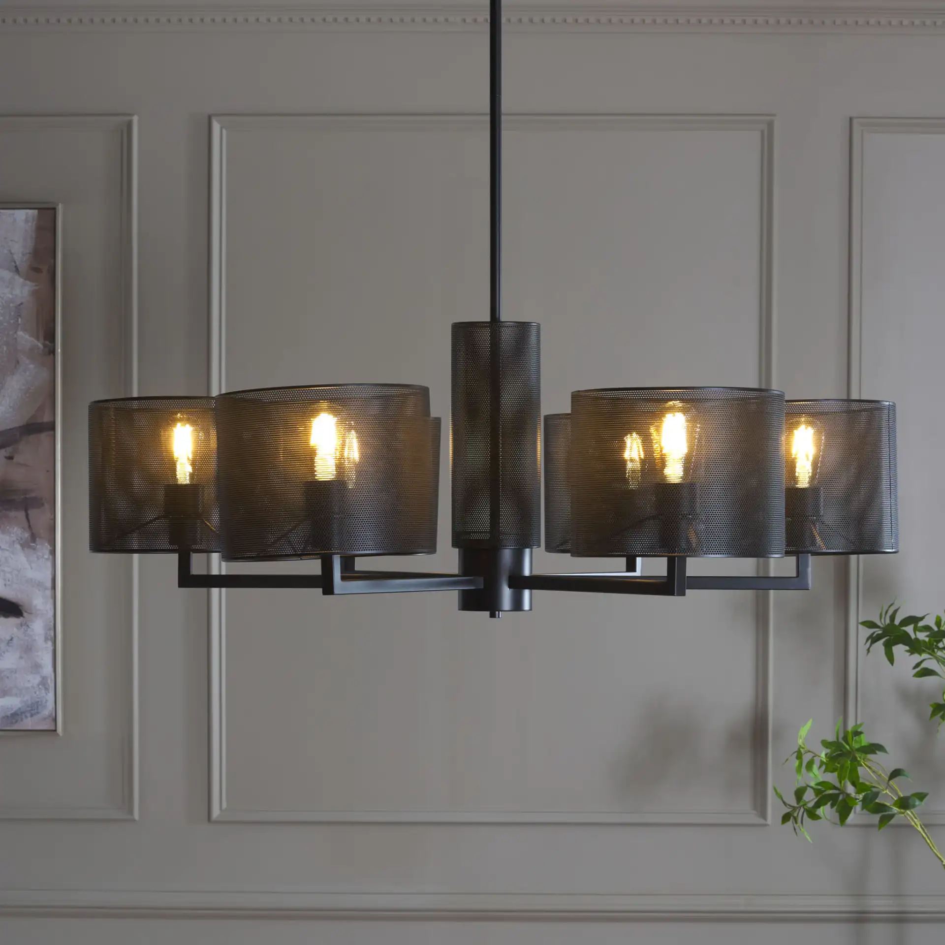 Zachaeus Six-Light Metal Chandelier in Black in a styled room