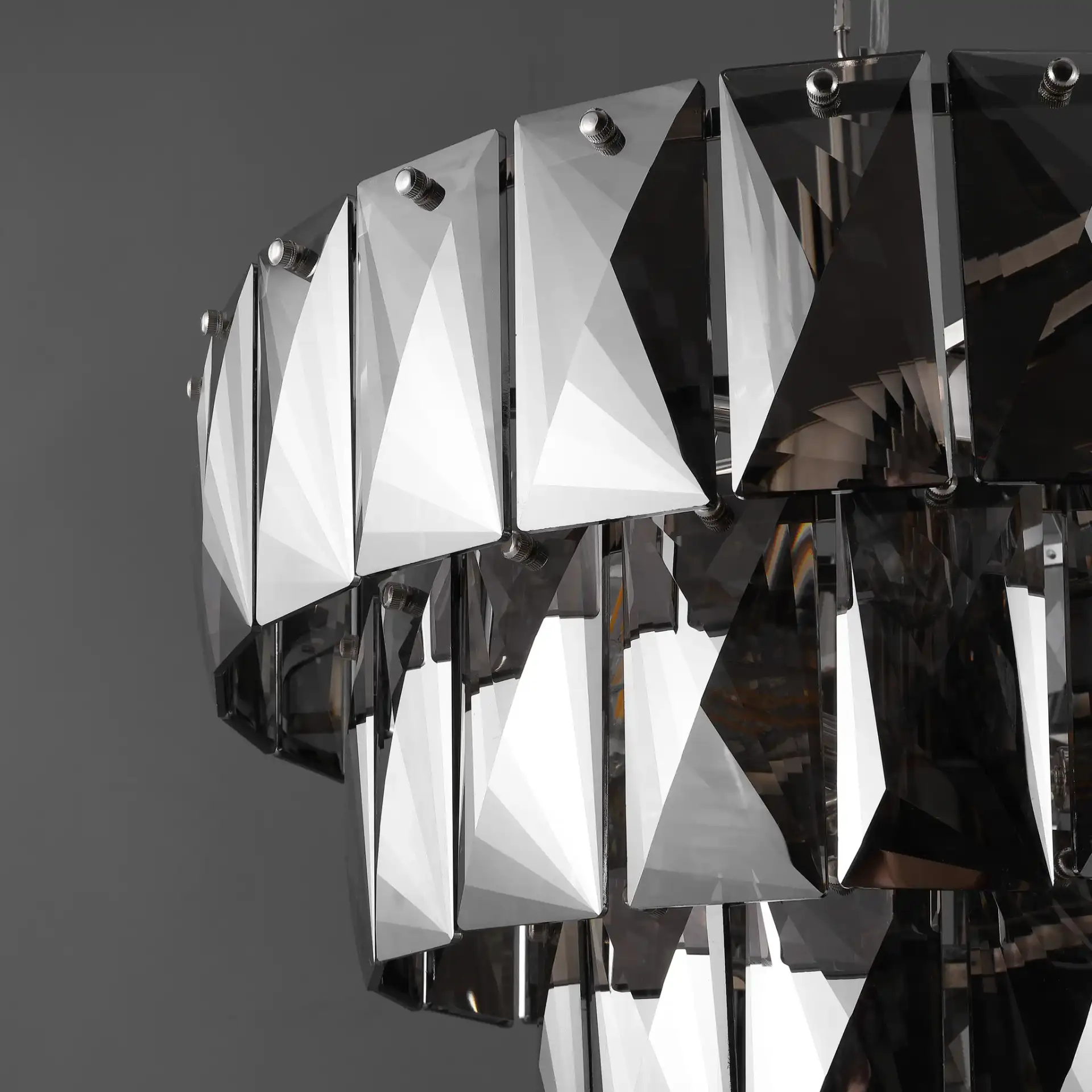 Jaylee Crystal Four-Tier Chandelier in Nickel / Dark Gray in a styled room