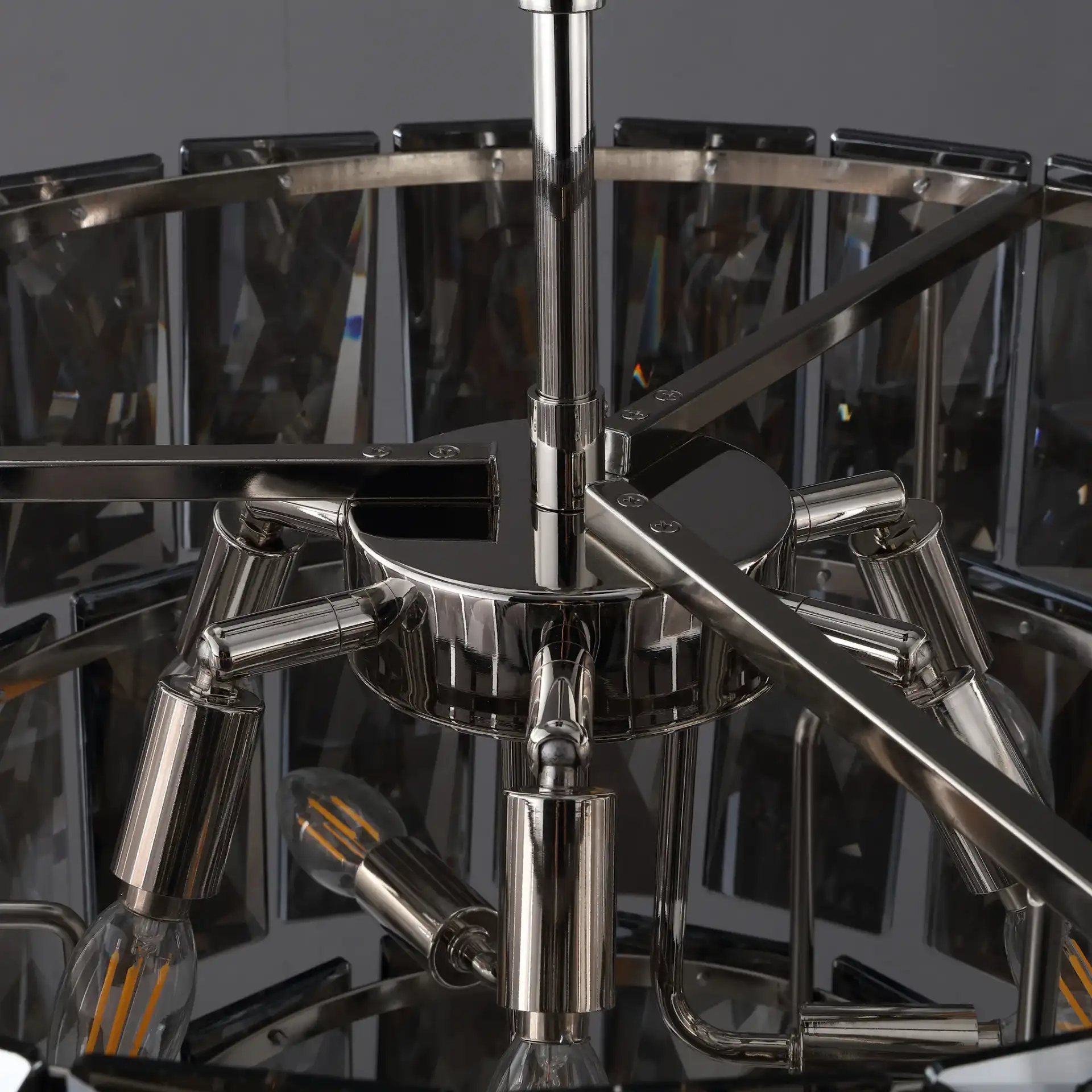 Jaylee Crystal Four-Tier Chandelier in Nickel / Dark Gray in a styled room