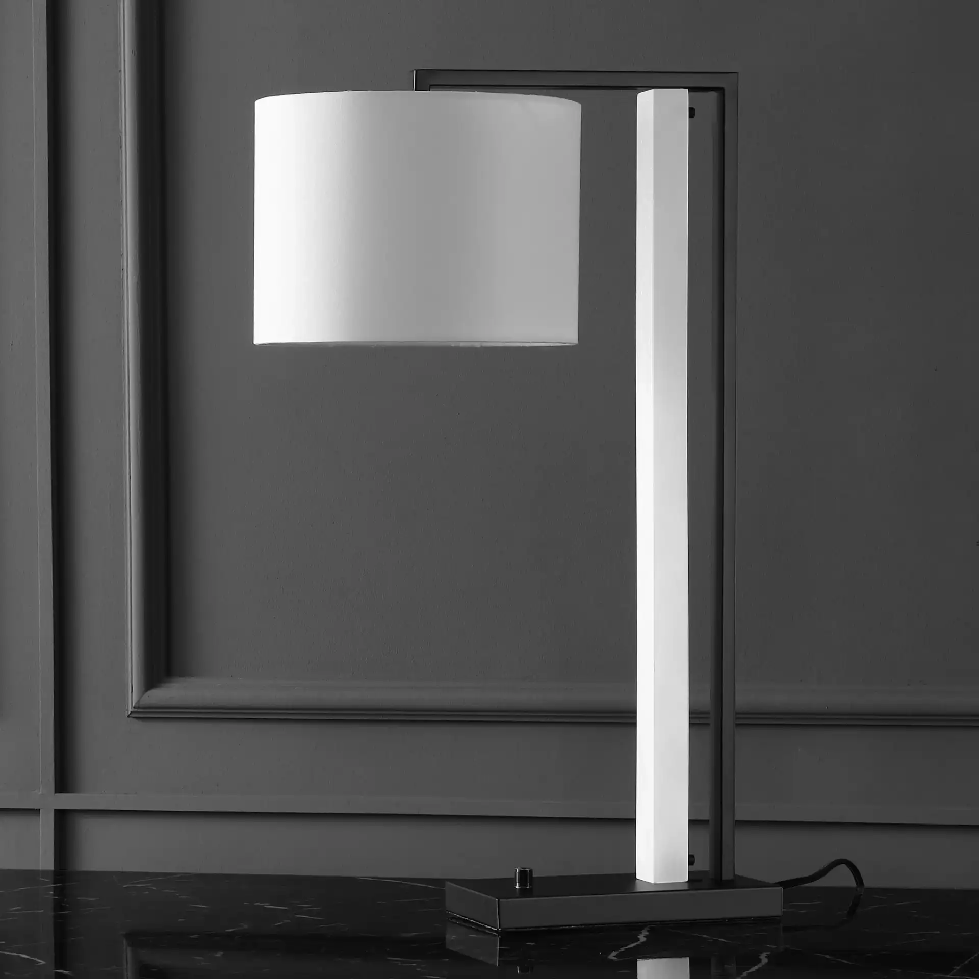 Katryna Alabaster Table Lamp in Black / White in a styled room
