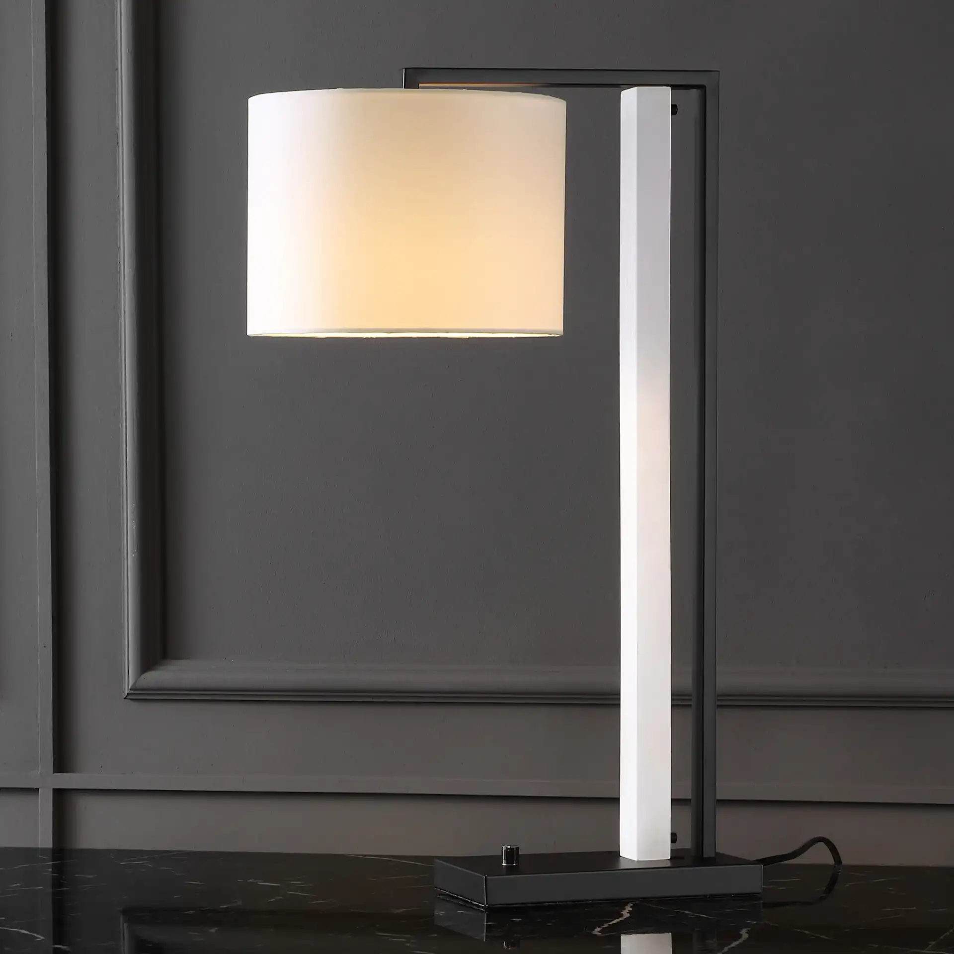 Katryna Alabaster Table Lamp in Black / White in a styled room