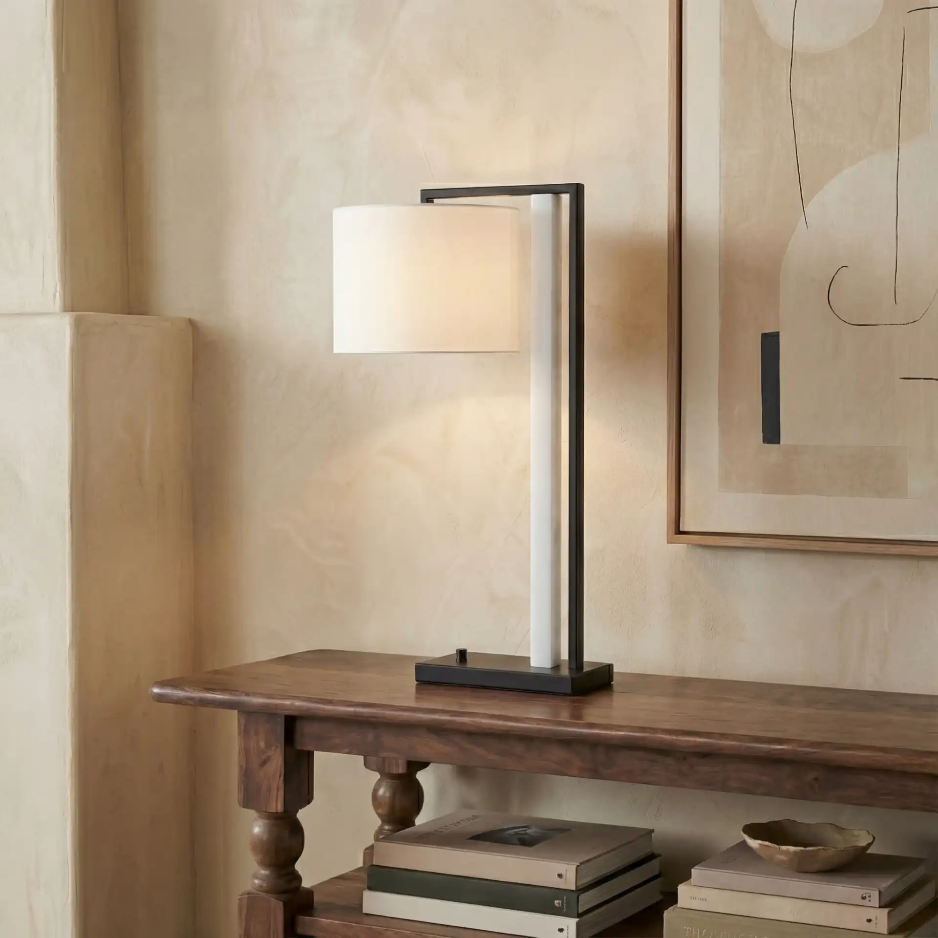 Katryna Alabaster Table Lamp in Black / White in a styled room