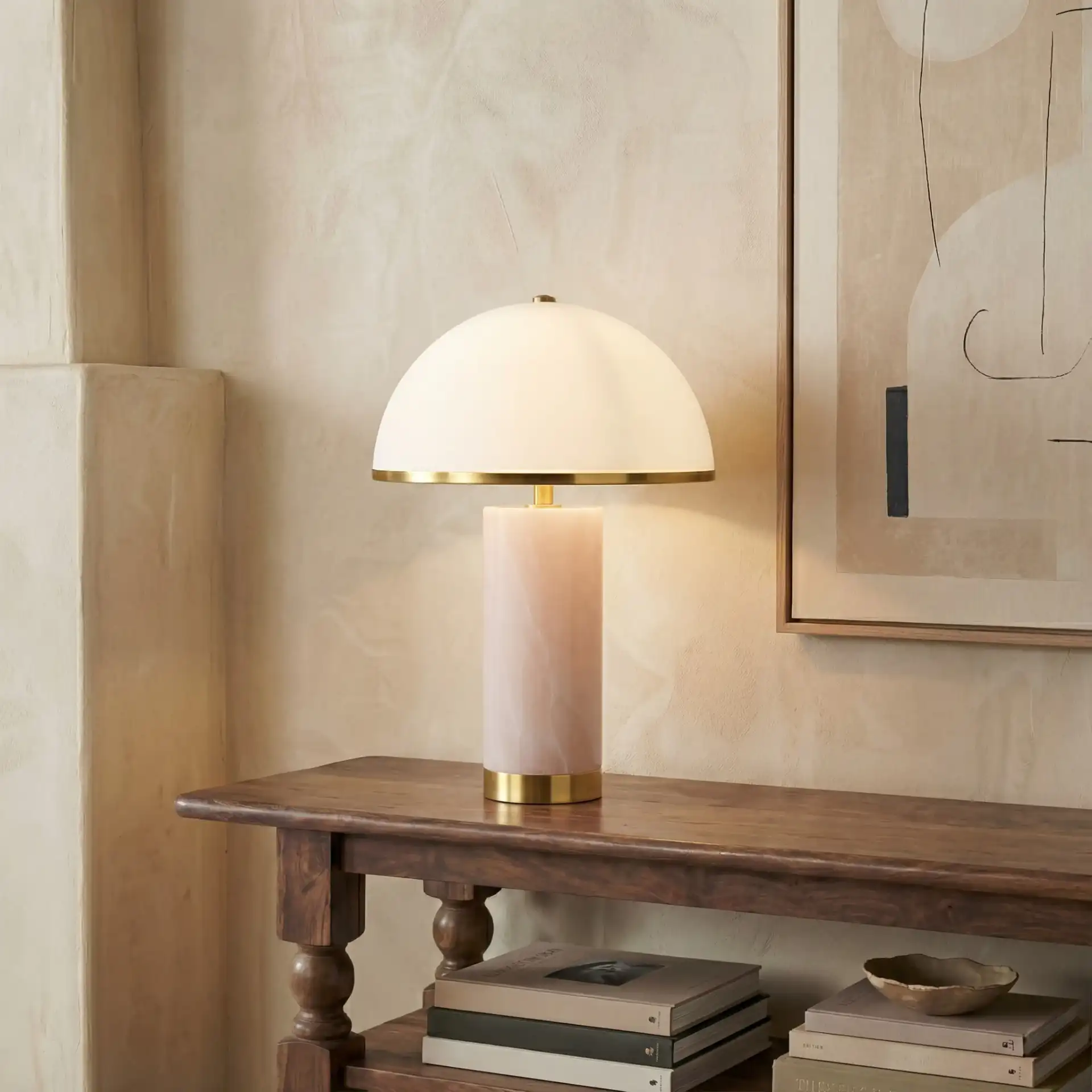 Izabel Alabaster Table Lamp in Gold / White in a styled room