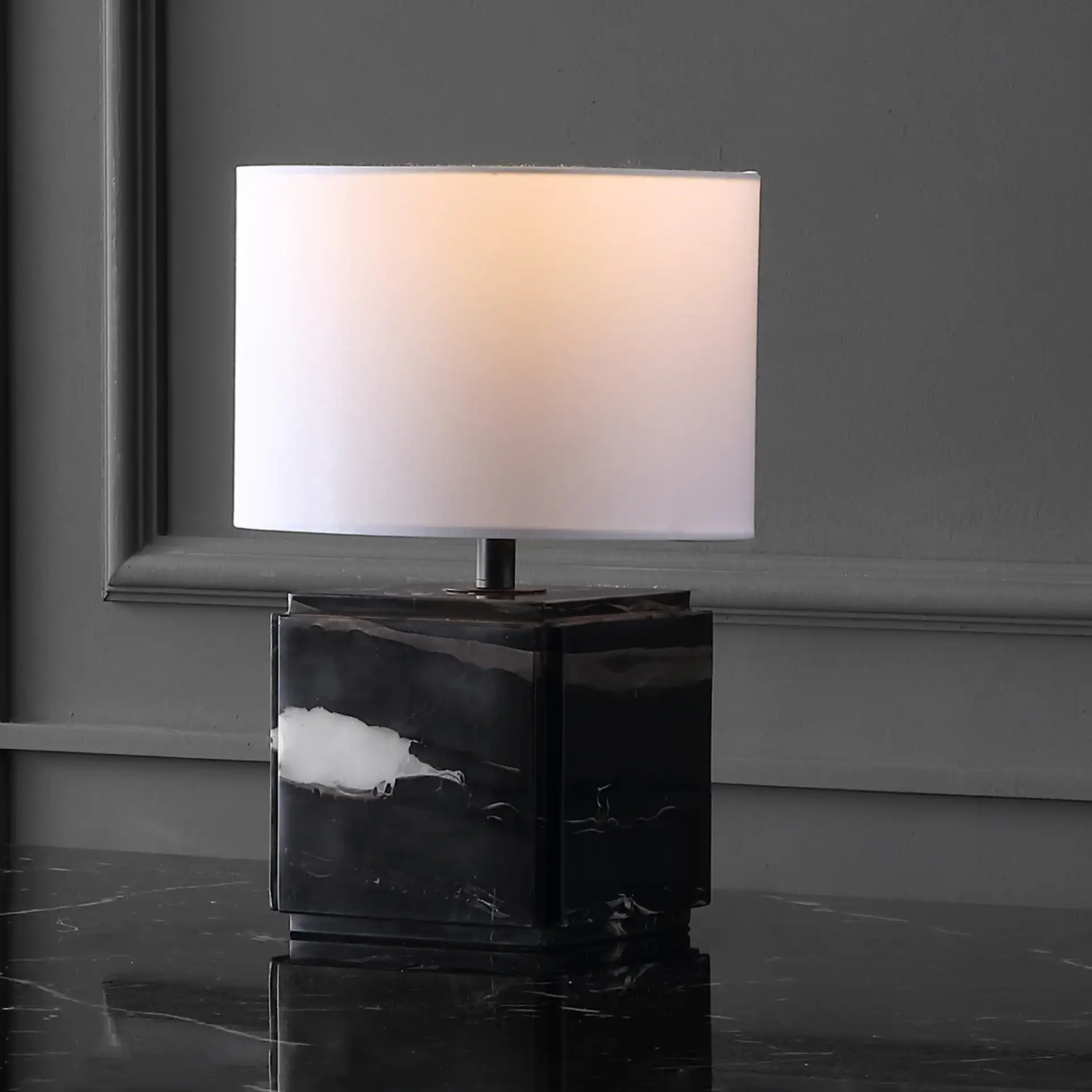 Zahra Marble Table Lamp in Black / White in a styled room