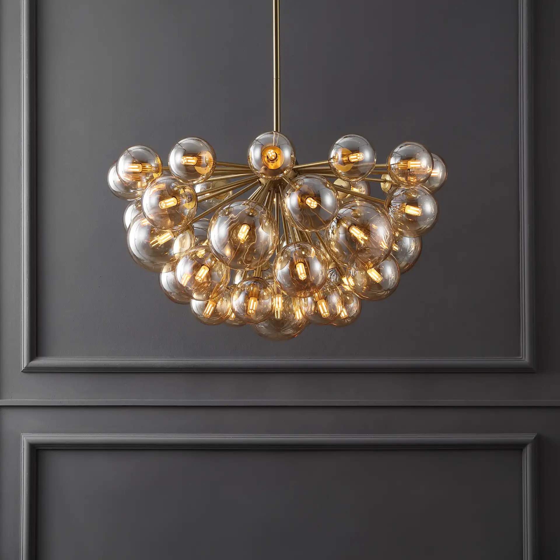 Raphaela Glass Globe Chandelier in Gold / White in a styled room