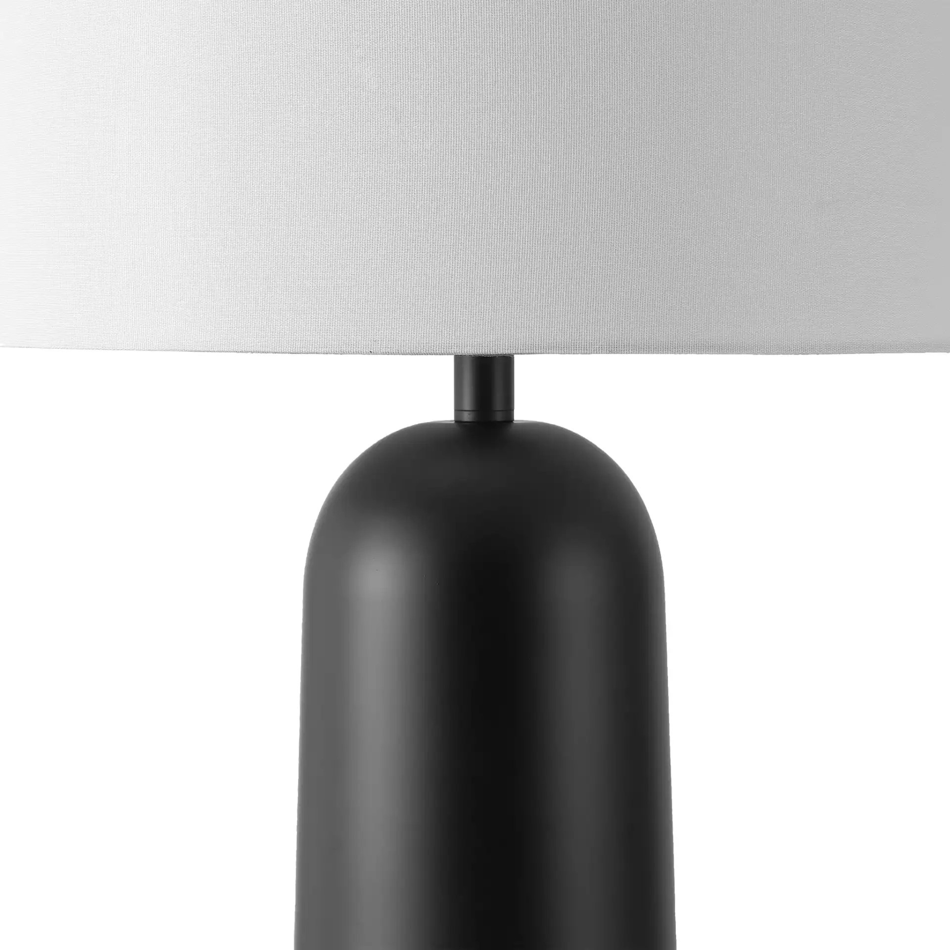Chadric Metal Table Lamp in Black / White in a styled room
