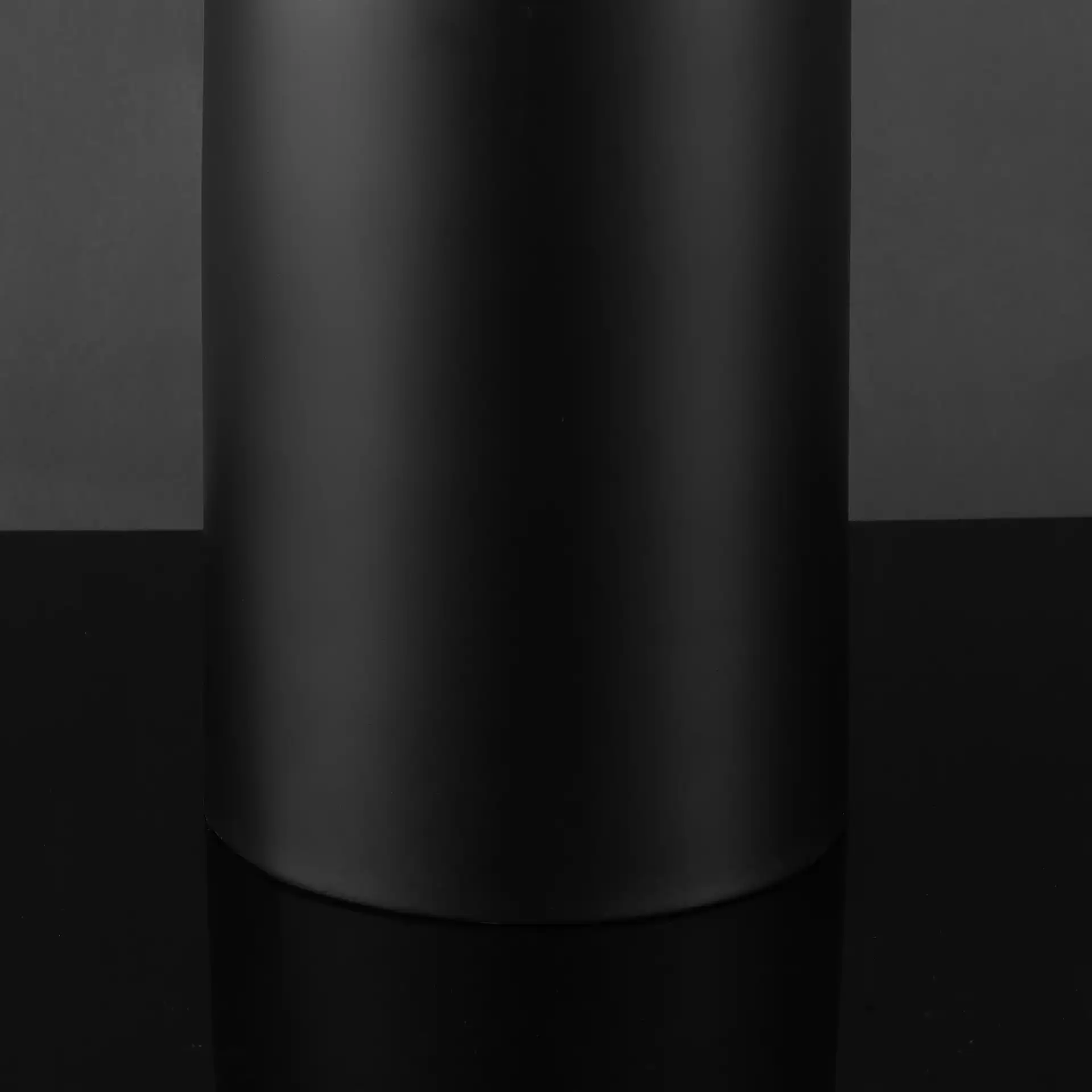 Chadric Metal Table Lamp in Black / White in a styled room