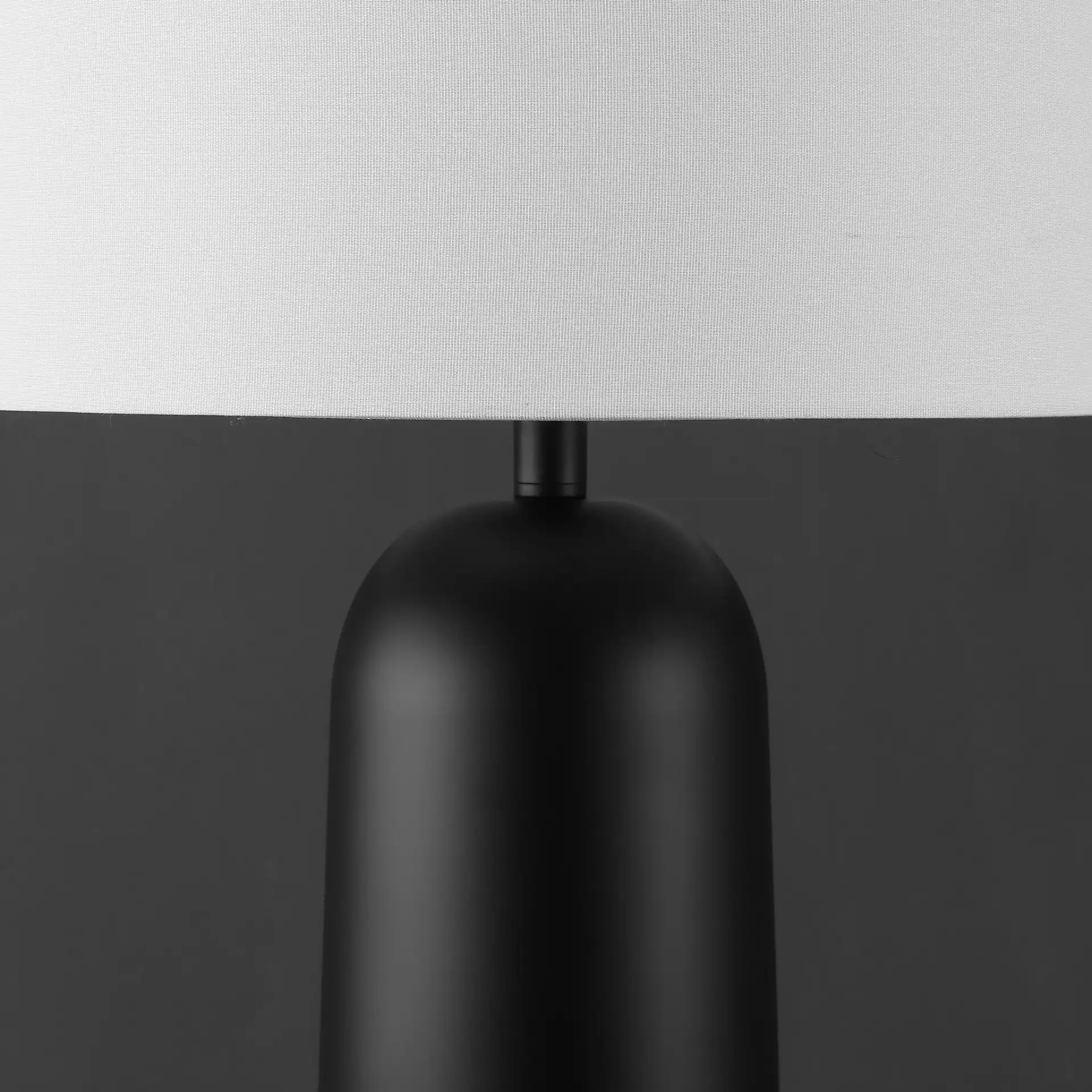 Chadric Metal Table Lamp in Black / White in a styled room