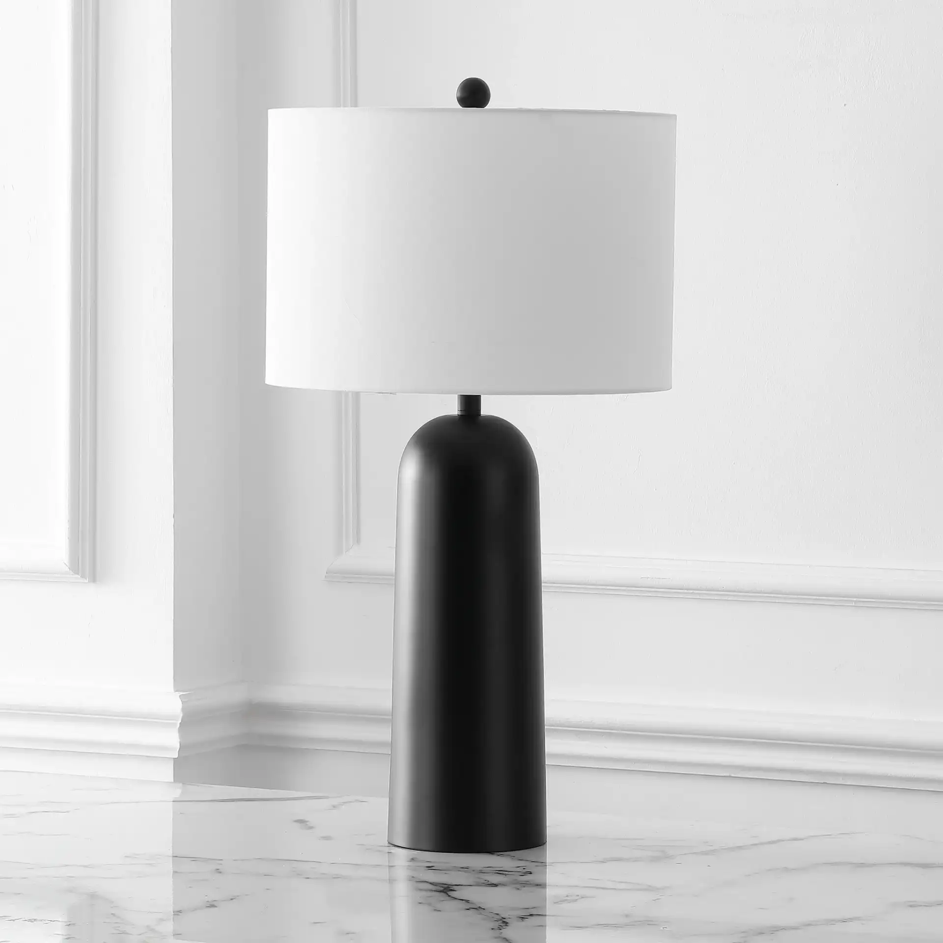 Chadric Metal Table Lamp in Black / White in a styled room