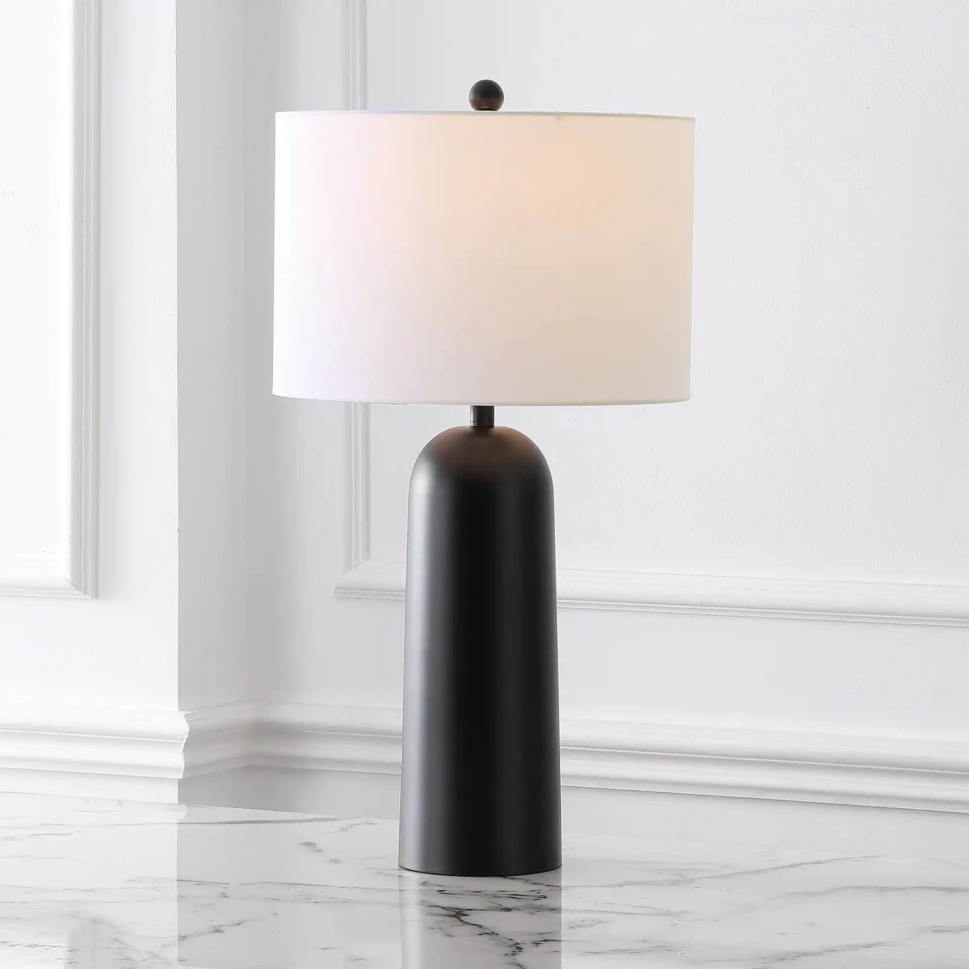 Chadric Metal Table Lamp in Black / White in a styled room