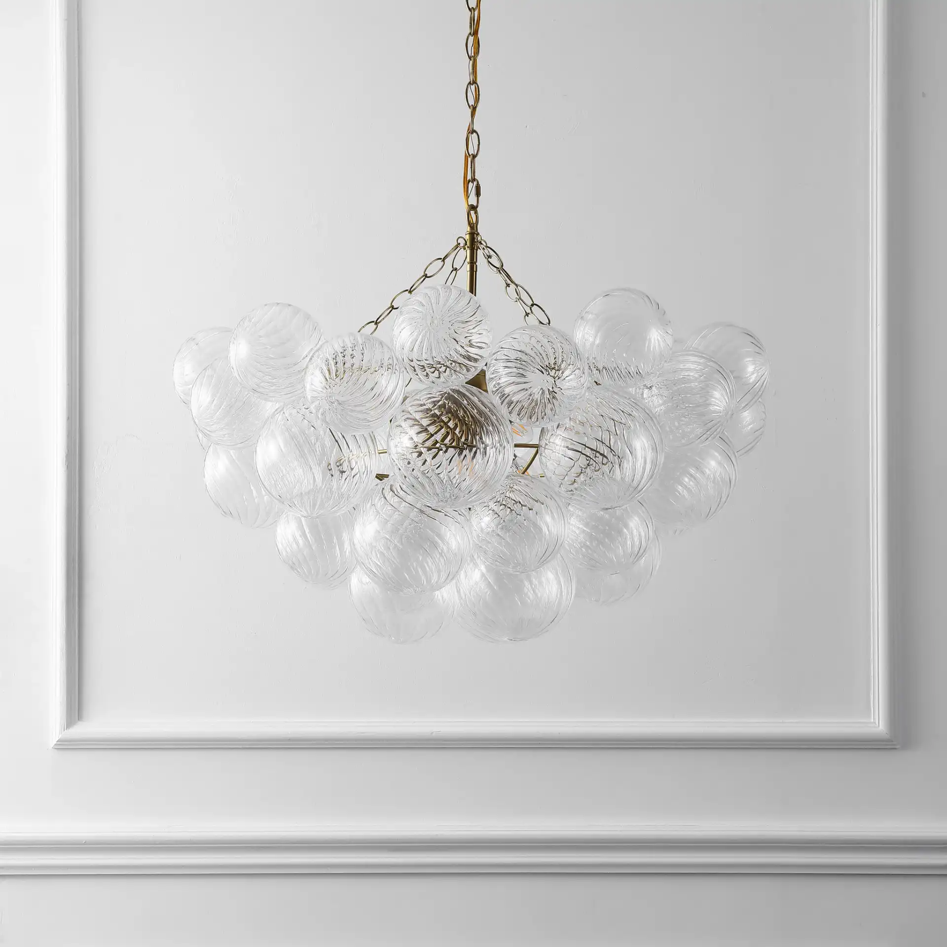 Betty Glass Bubbles Chandelier in Brass / Clear in a styled room