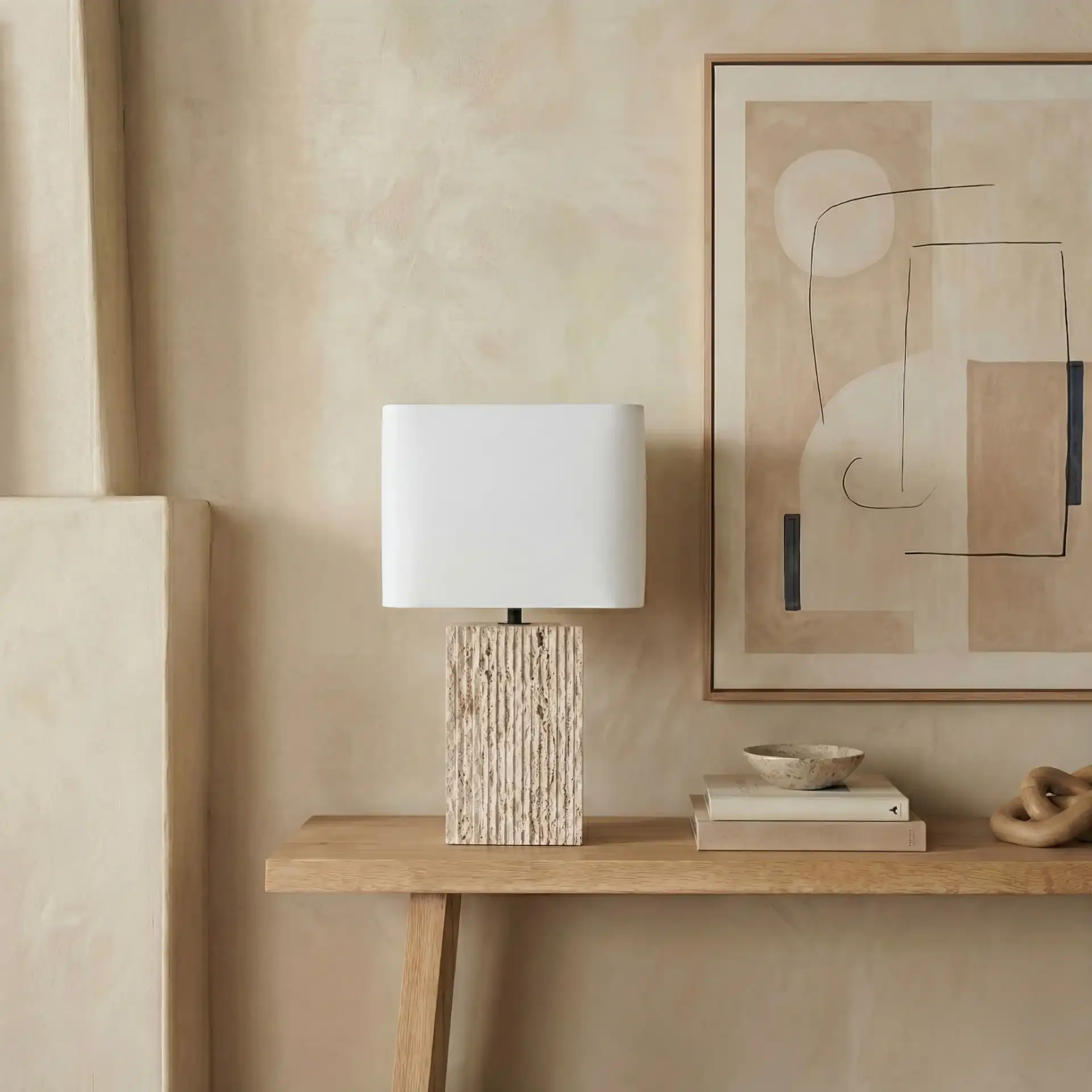 Henry Travertine Table Lamp in Travertine / White in a styled room