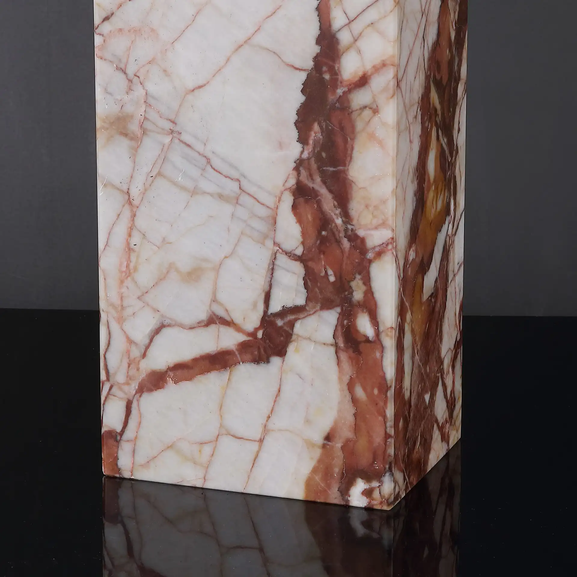 Chrisette Marble Base Table Lamp in White / Red in a styled room