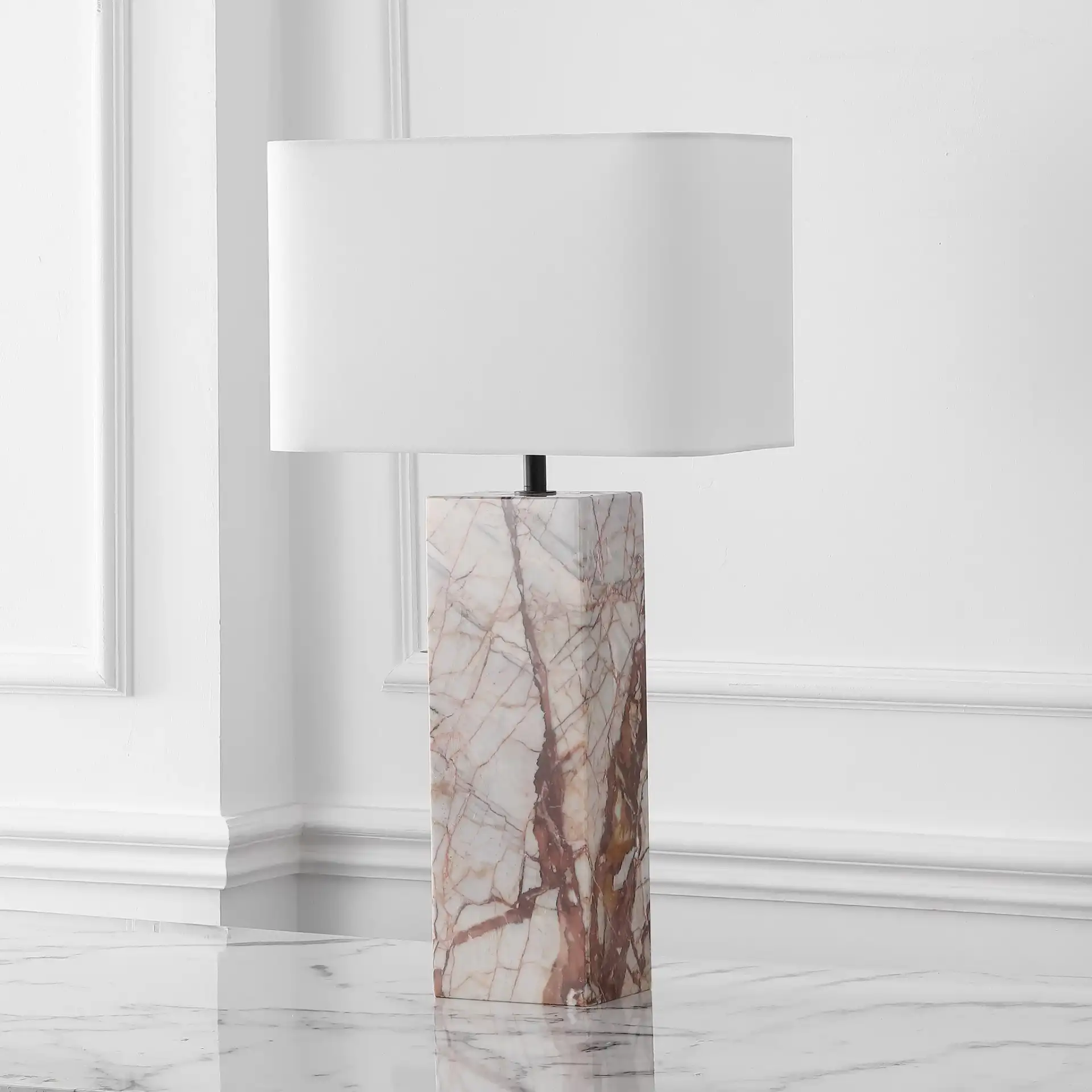 Chrisette Marble Base Table Lamp in White / Red in a styled room