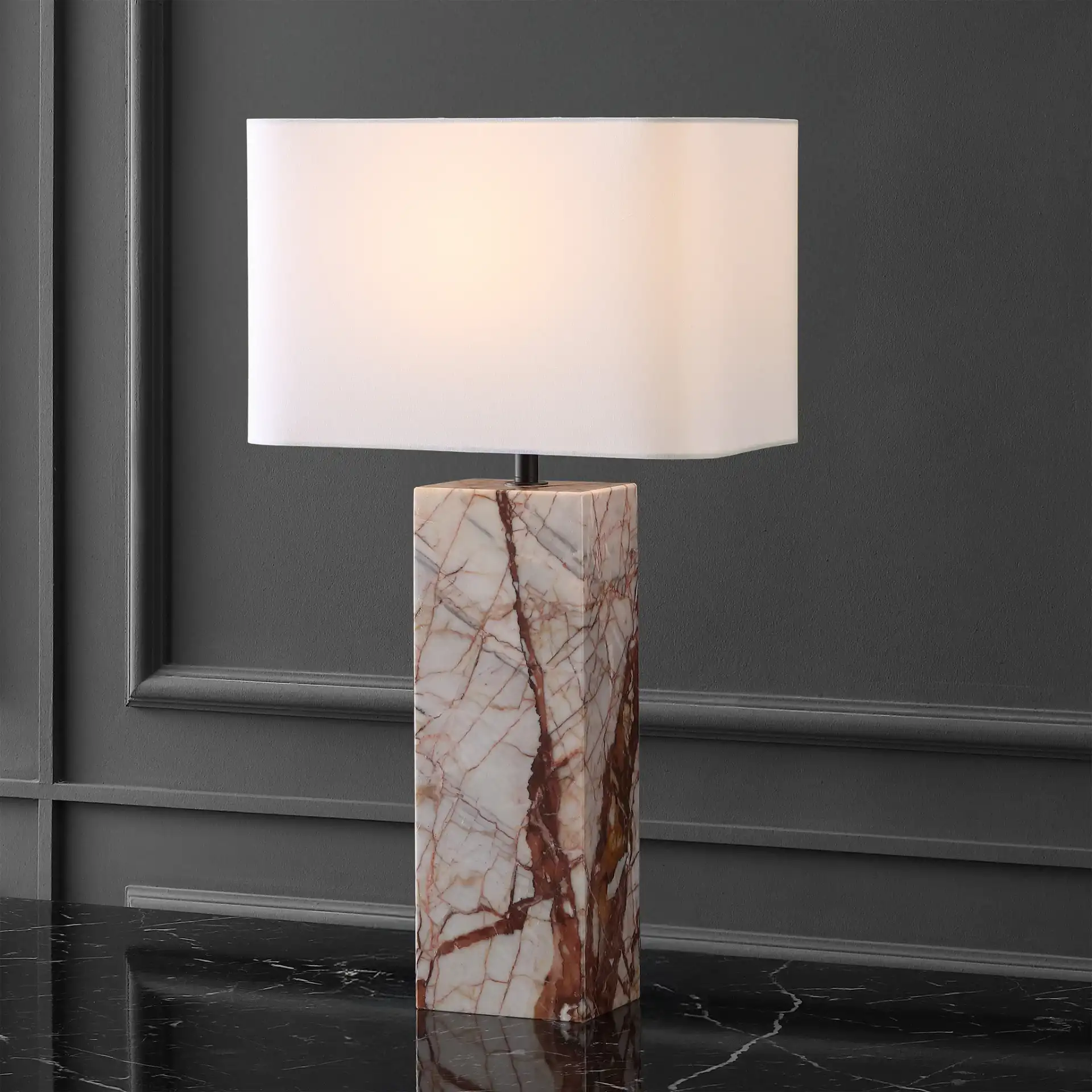 Chrisette Marble Base Table Lamp in White / Red in a styled room