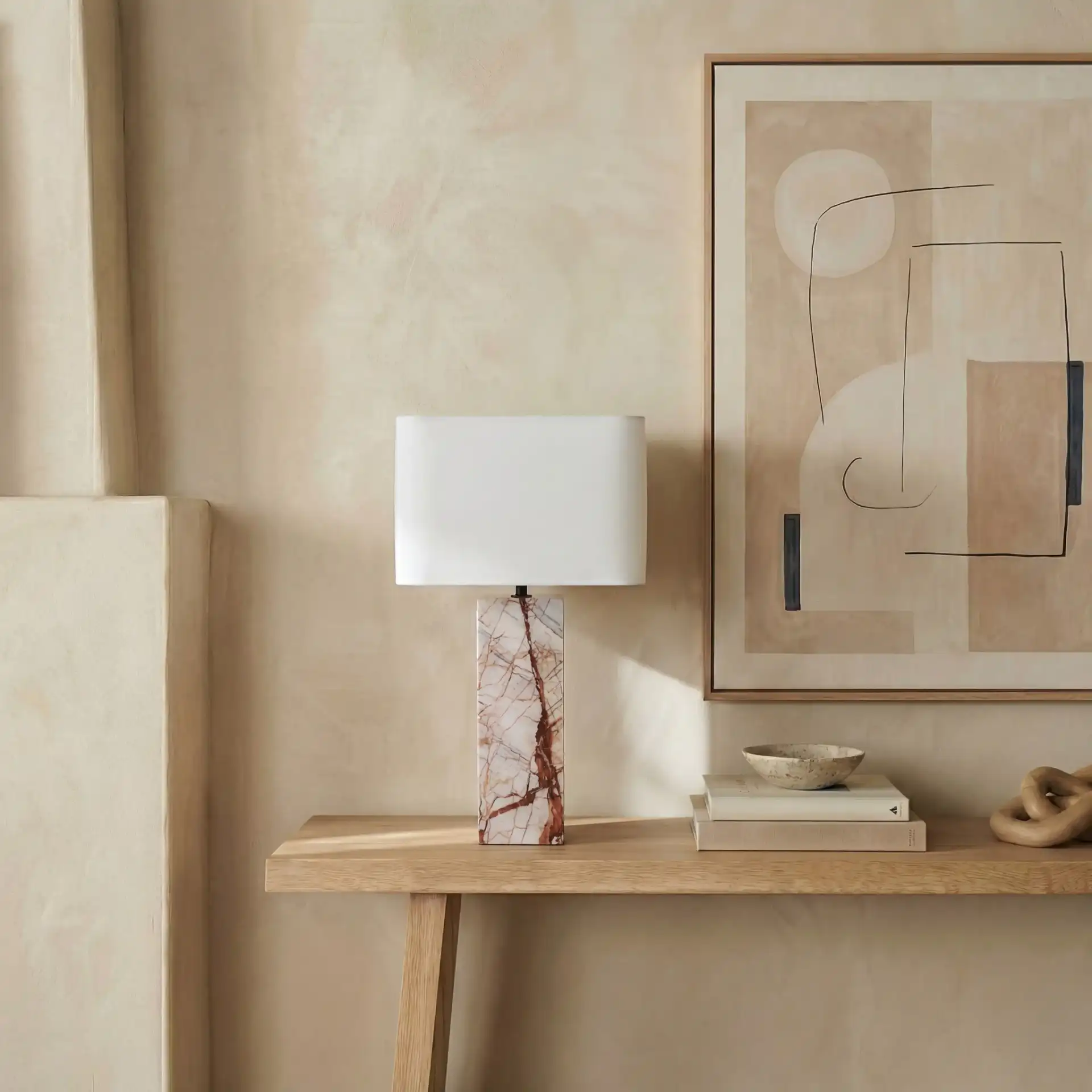 Chrisette Marble Base Table Lamp in White / Red in a styled room