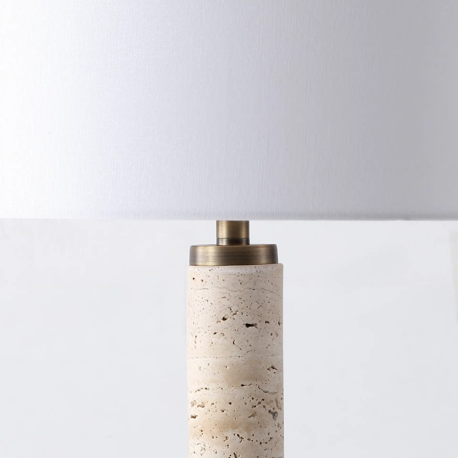 Elinora Travertine Table Lamp in Travertine / White in a styled room