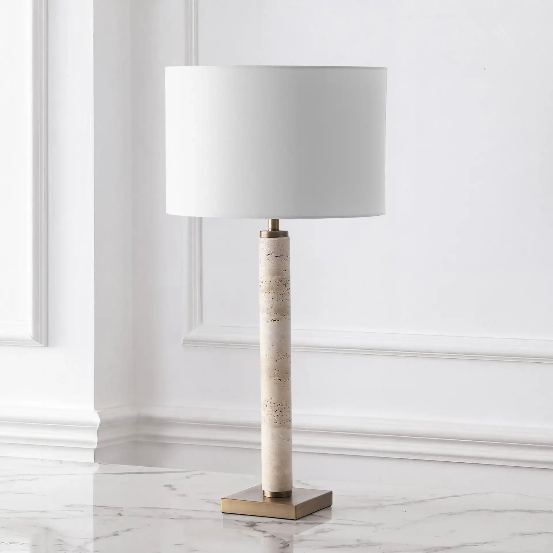 Elinora Travertine Table Lamp in Travertine / White in a styled room