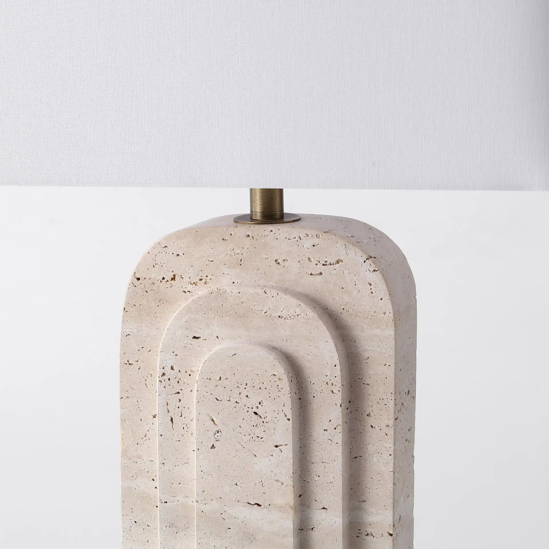 Rodrick Travertine Table Lamp in Travertine / White in a styled room