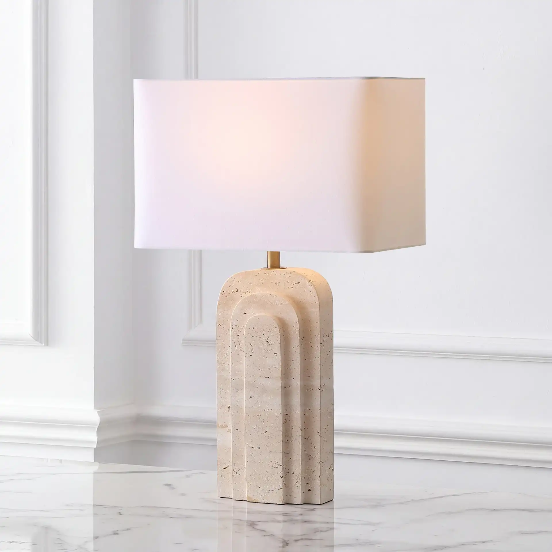 Rodrick Travertine Table Lamp in Travertine / White in a styled room