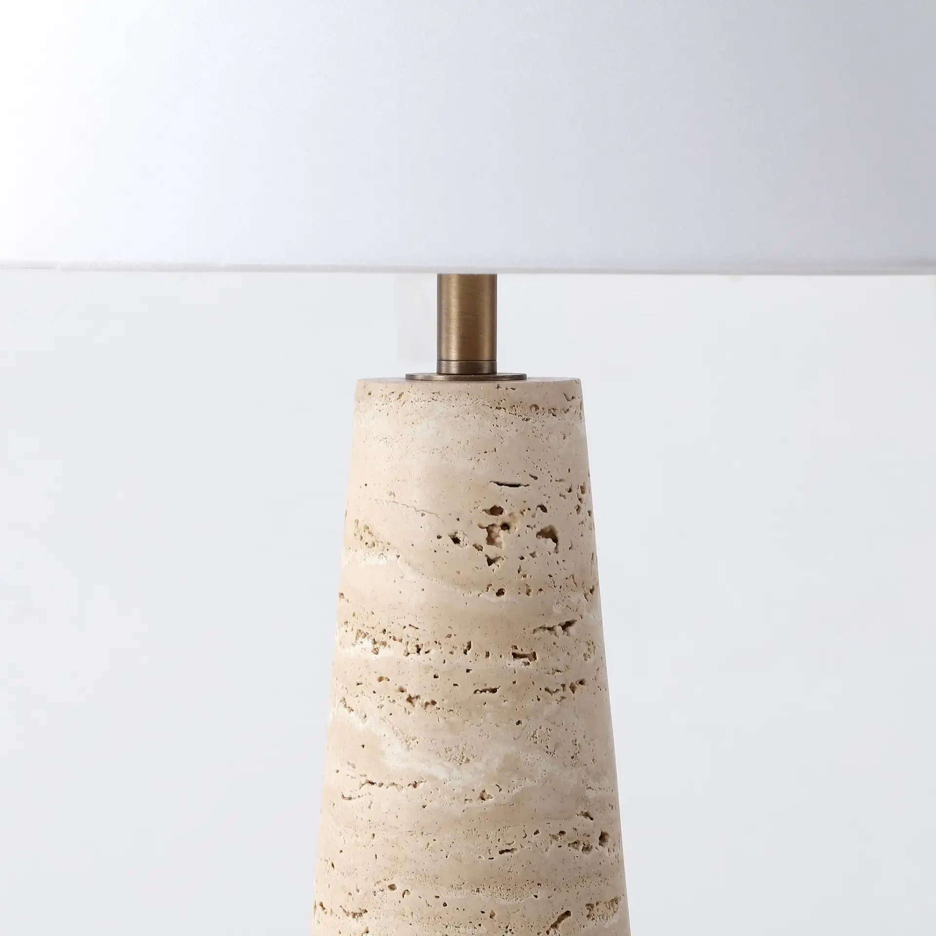 Dante Travertine Table Lamp in Travertine / White in a styled room