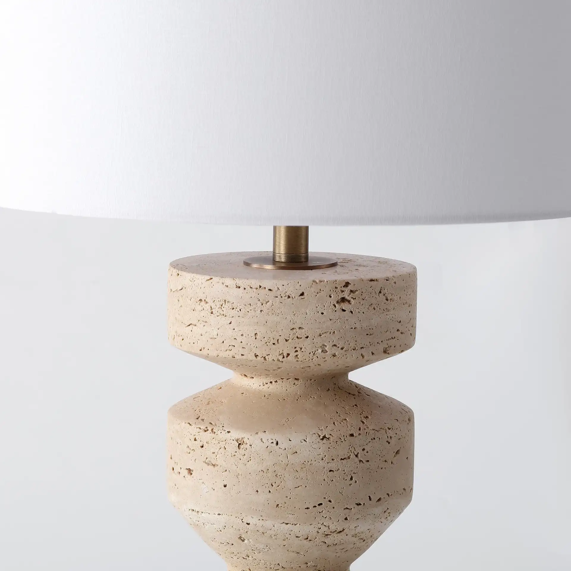 Jiminy Travertine Table Lamp in Travertine / White in a styled room