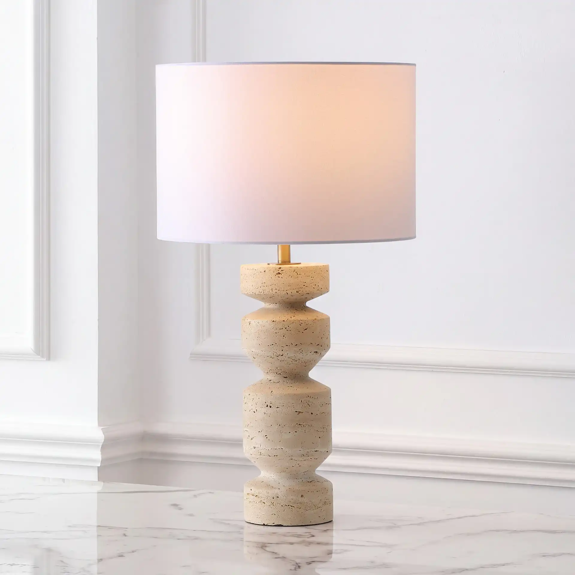 Jiminy Travertine Table Lamp in Travertine / White in a styled room