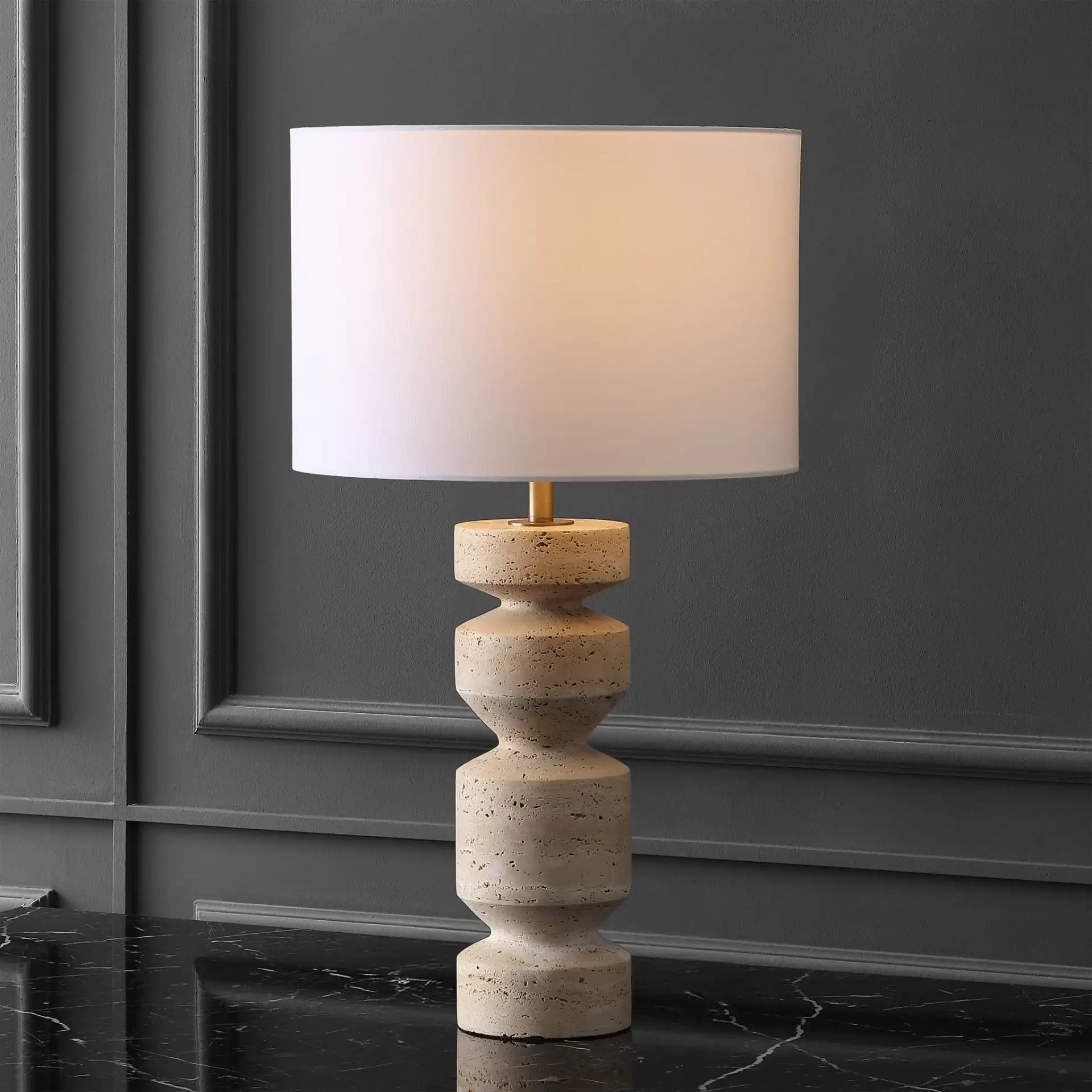 Jiminy Travertine Table Lamp in Travertine / White in a styled room
