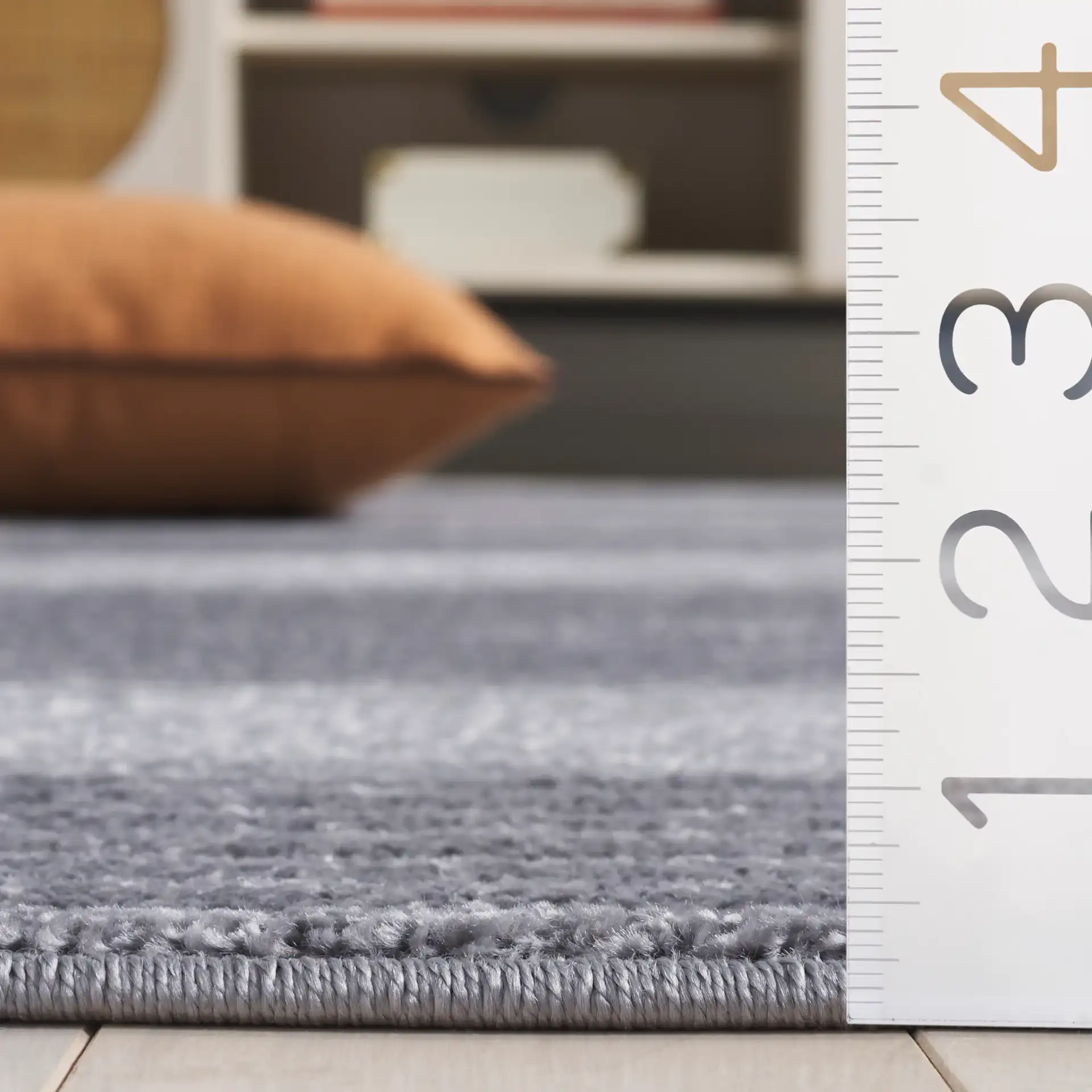 Contour Scalloped Loop Rug in Gray / Dark Gray in a styled room