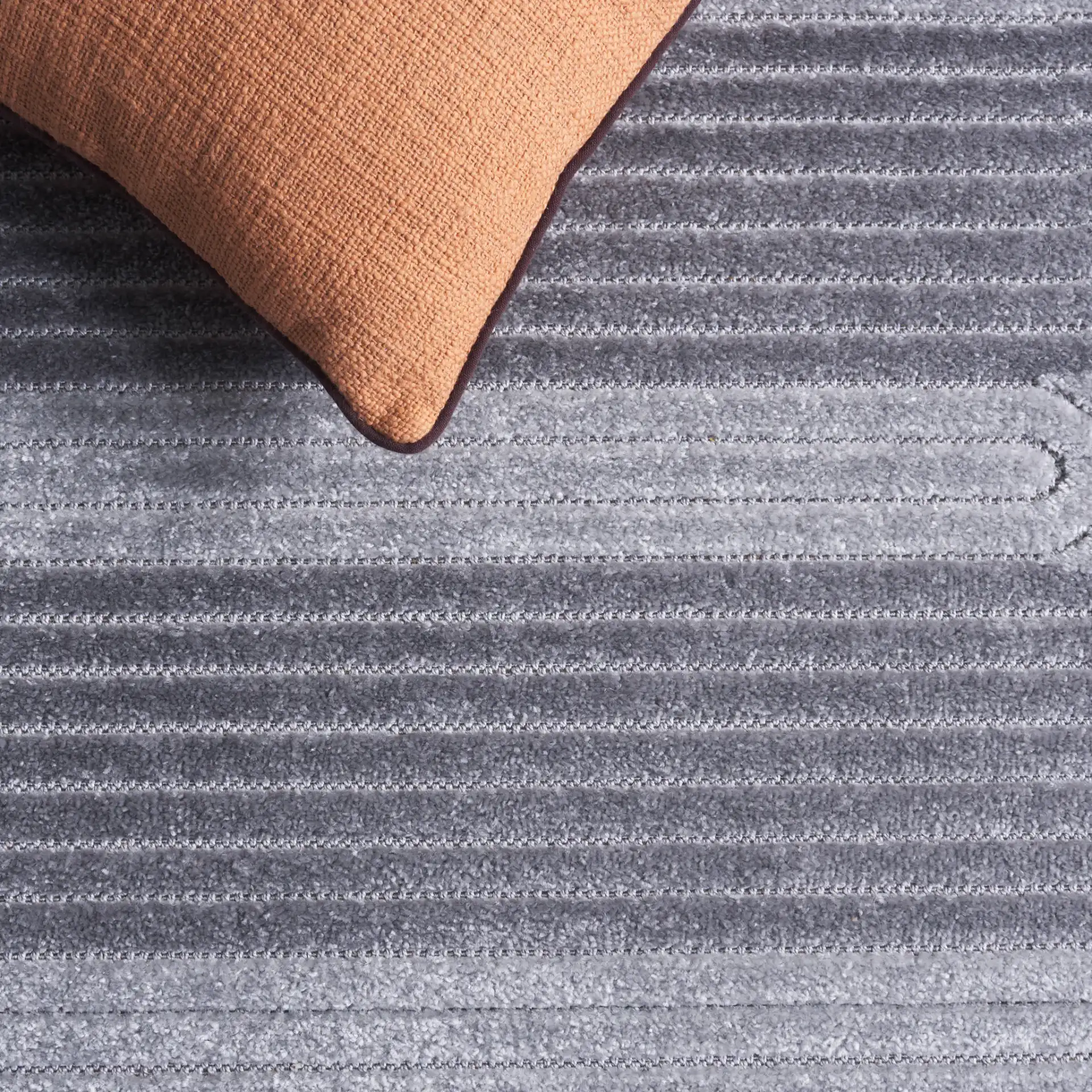 Contour Scalloped Loop Rug in Gray / Dark Gray in a styled room