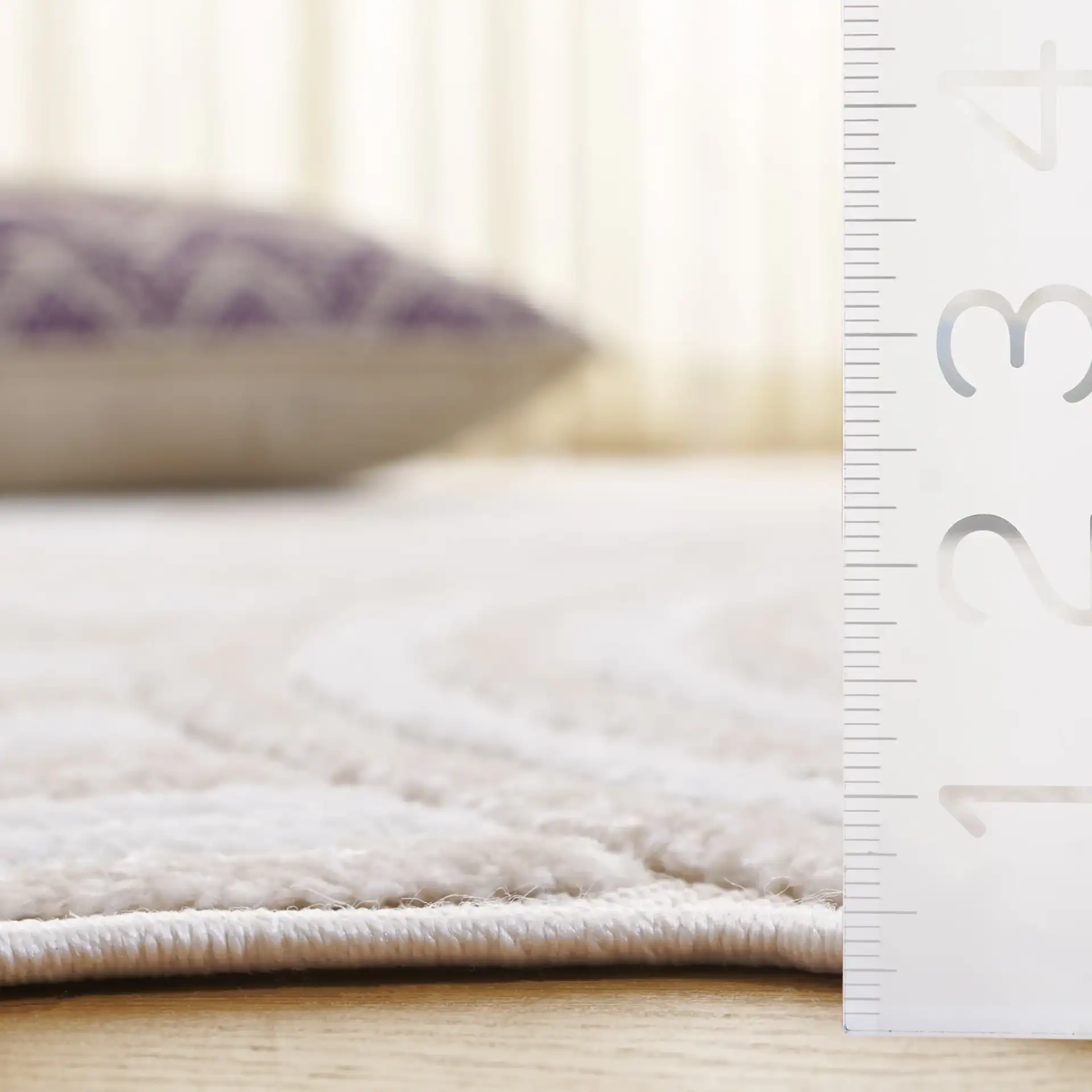 Contour Concentric Rings Rug in Ivory / Beige in a styled room