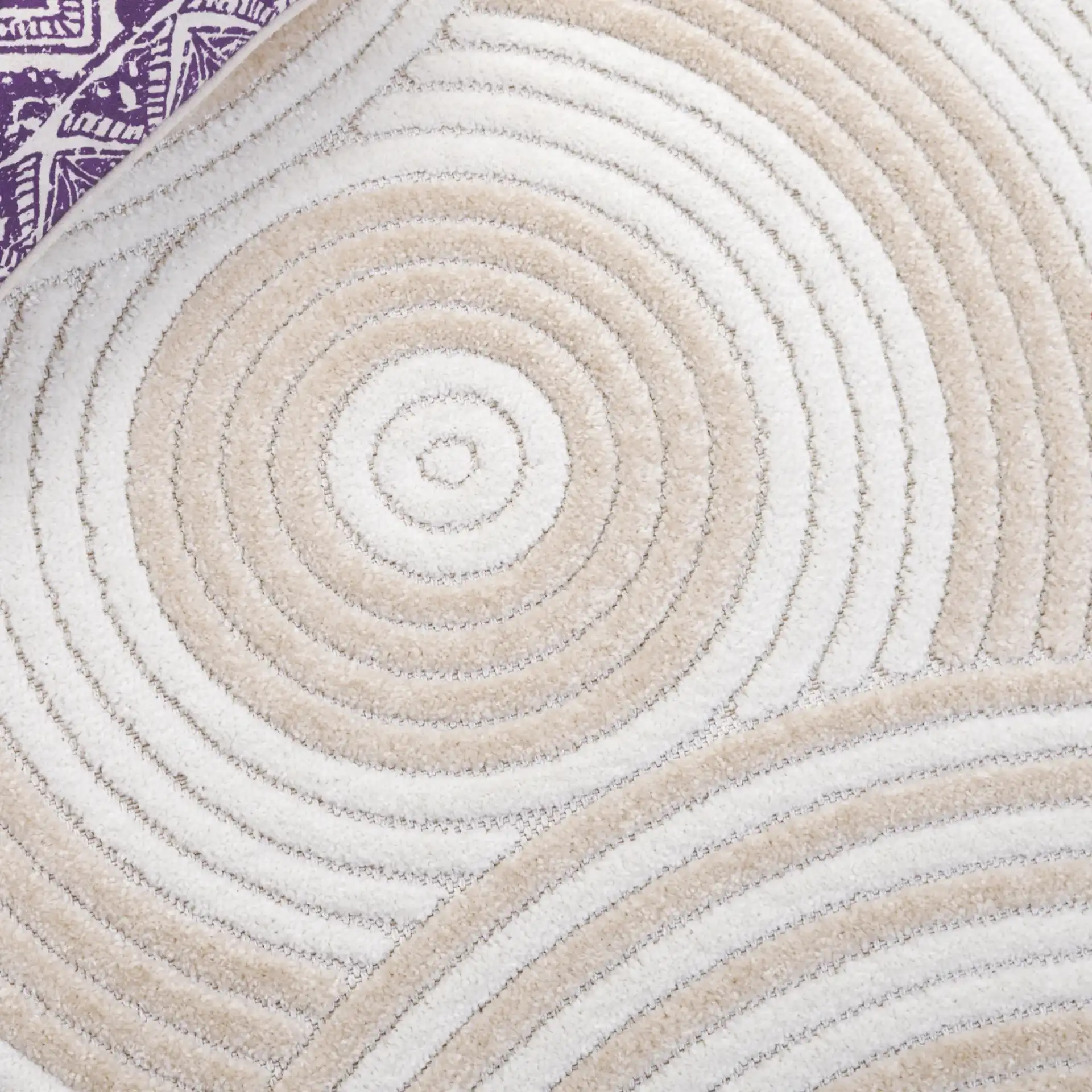 Contour Concentric Rings Rug in Ivory / Beige in a styled room