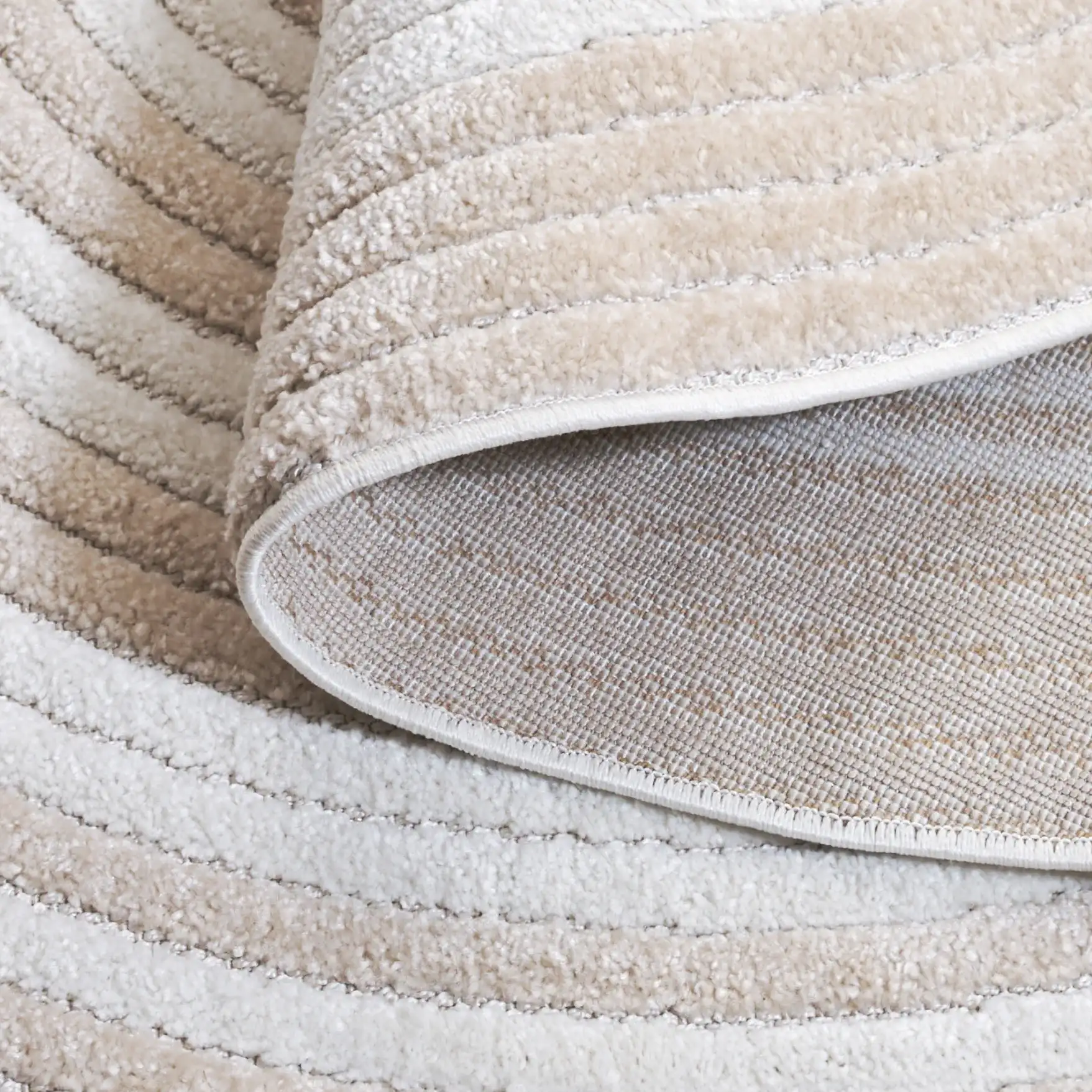Contour Concentric Rings Rug in Ivory / Beige in a styled room