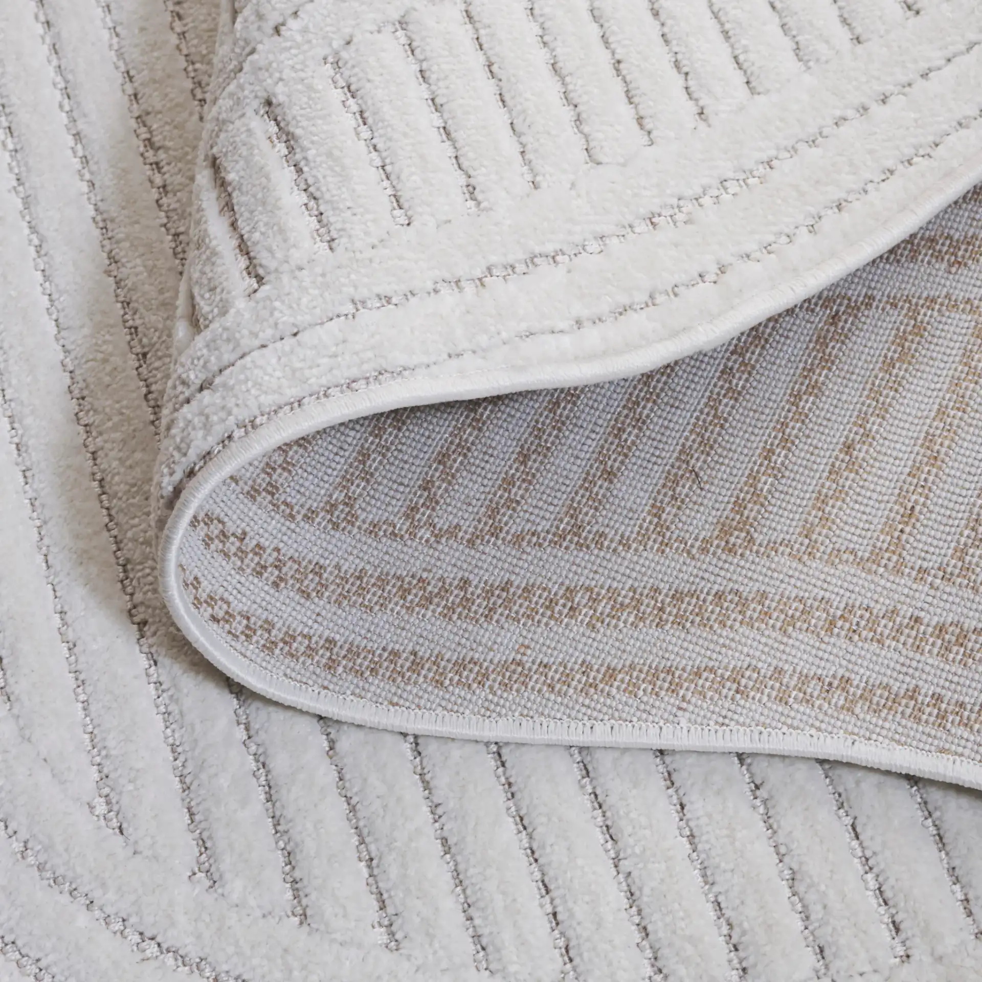 Contour Wavy Ribbed Rug in Ivory in a styled room