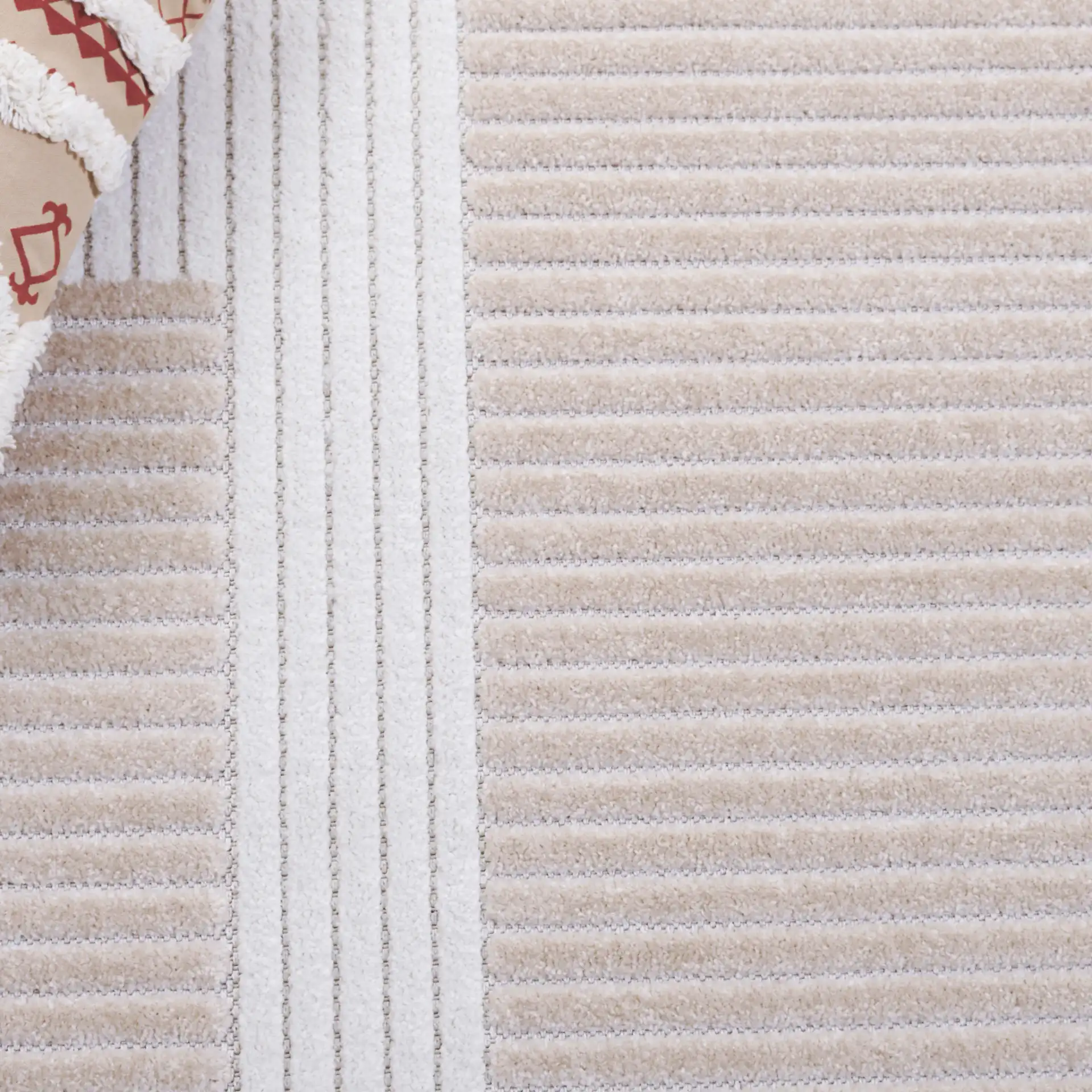 Contour Curved Block Rug in Ivory / Beige in a styled room