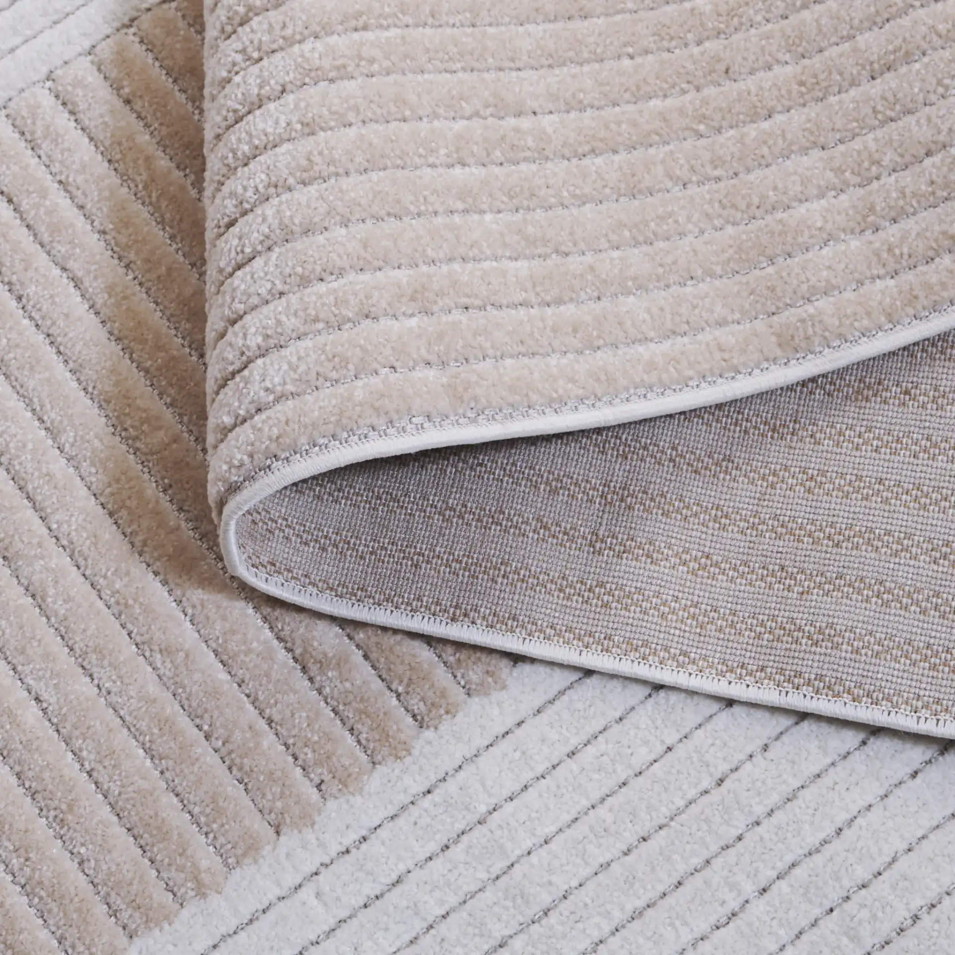 Contour Curved Block Rug in Ivory / Beige in a styled room
