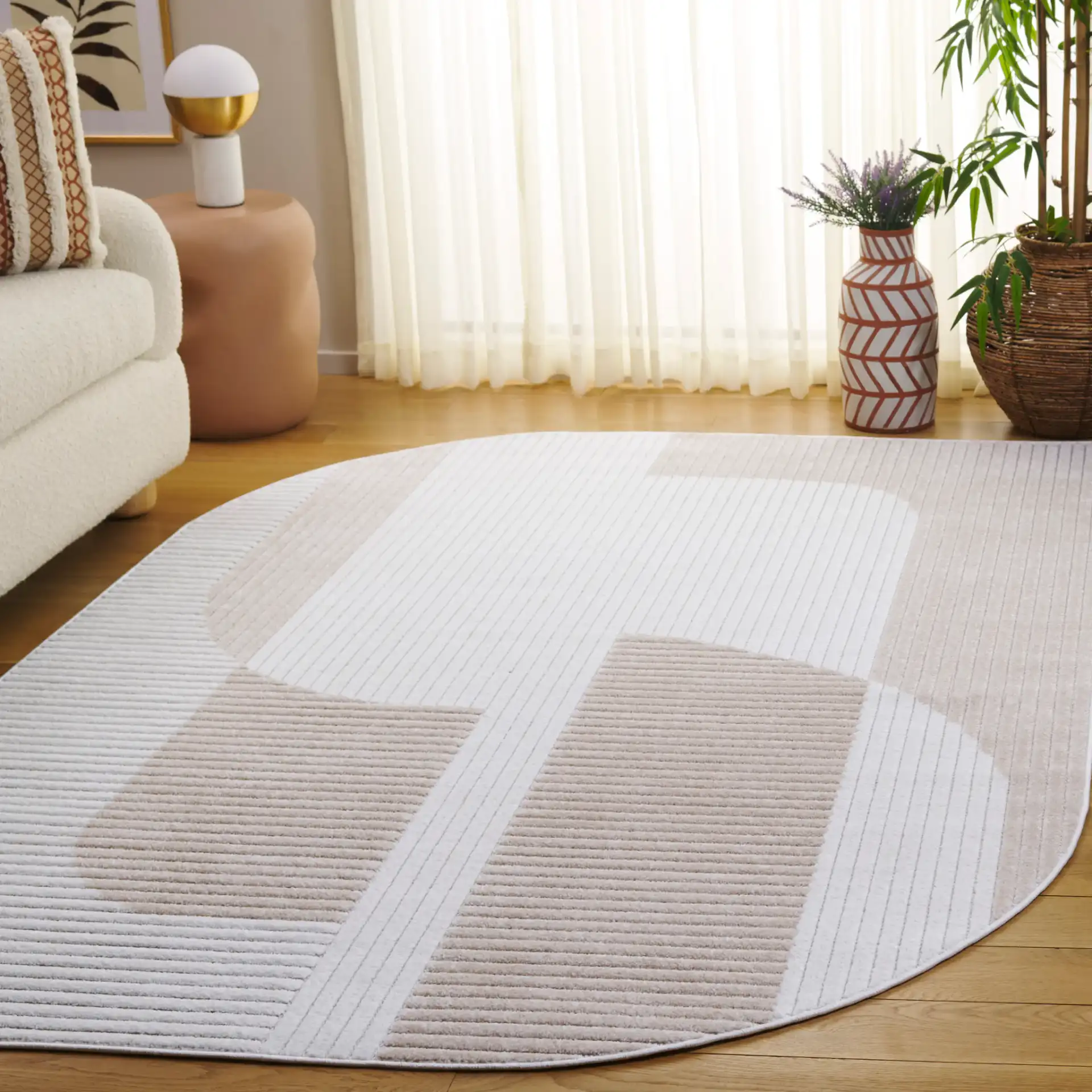 Contour Curved Block Rug in Ivory / Beige in a styled room