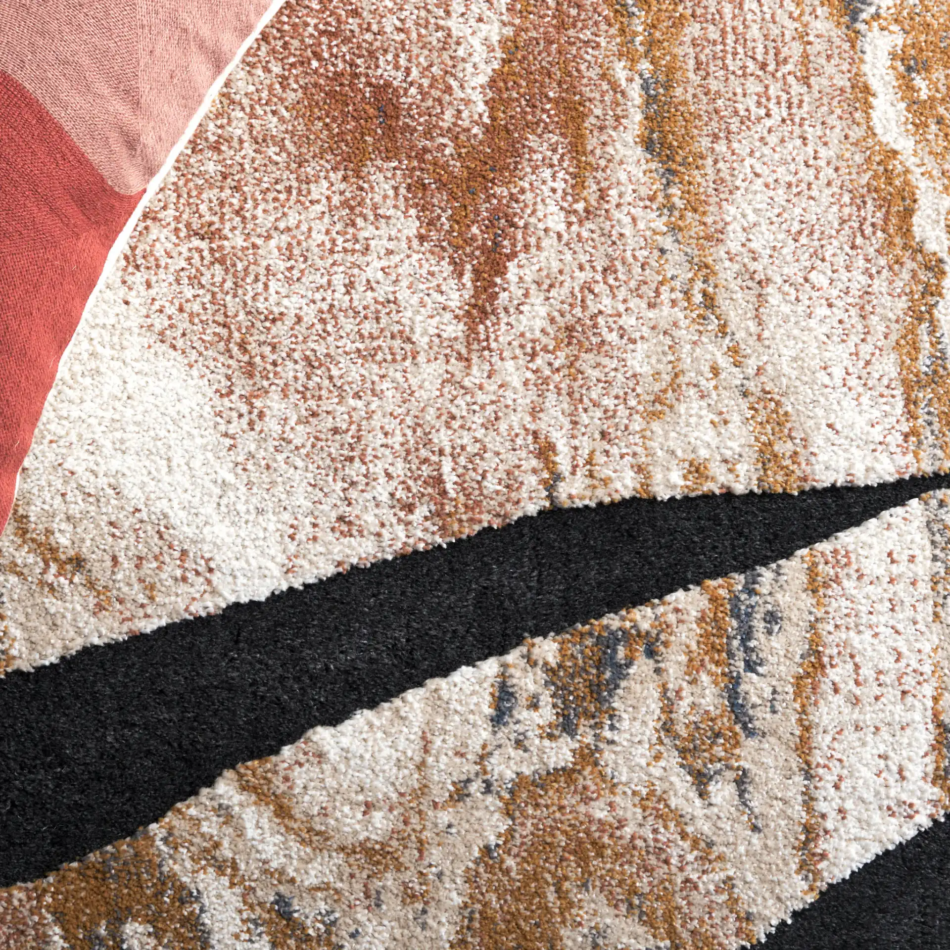 Contour Abstract Marbled Rug in Rust / Ivory in a styled room